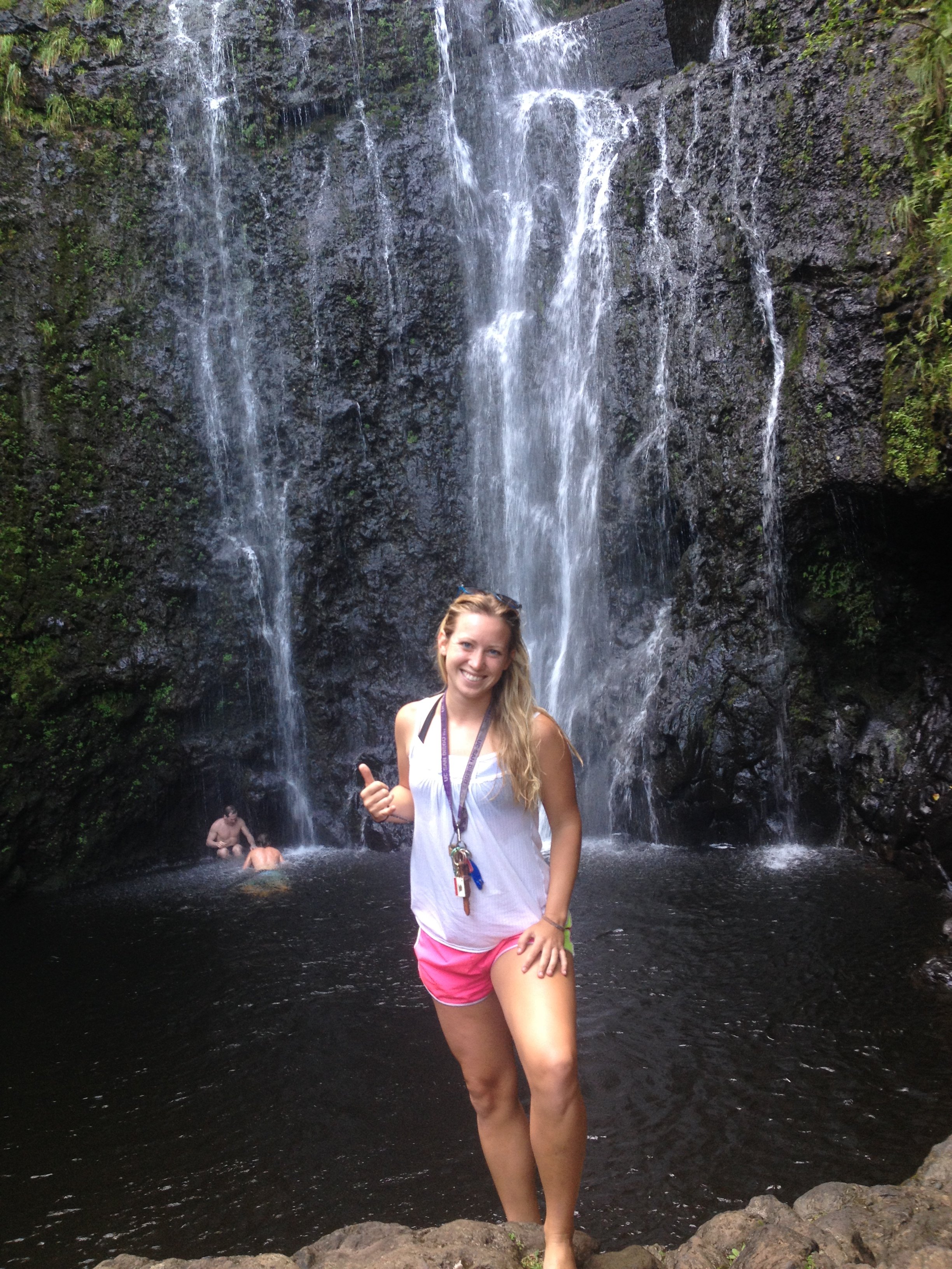 Bridget at Wailua Falls along the Road to Hana in Maui