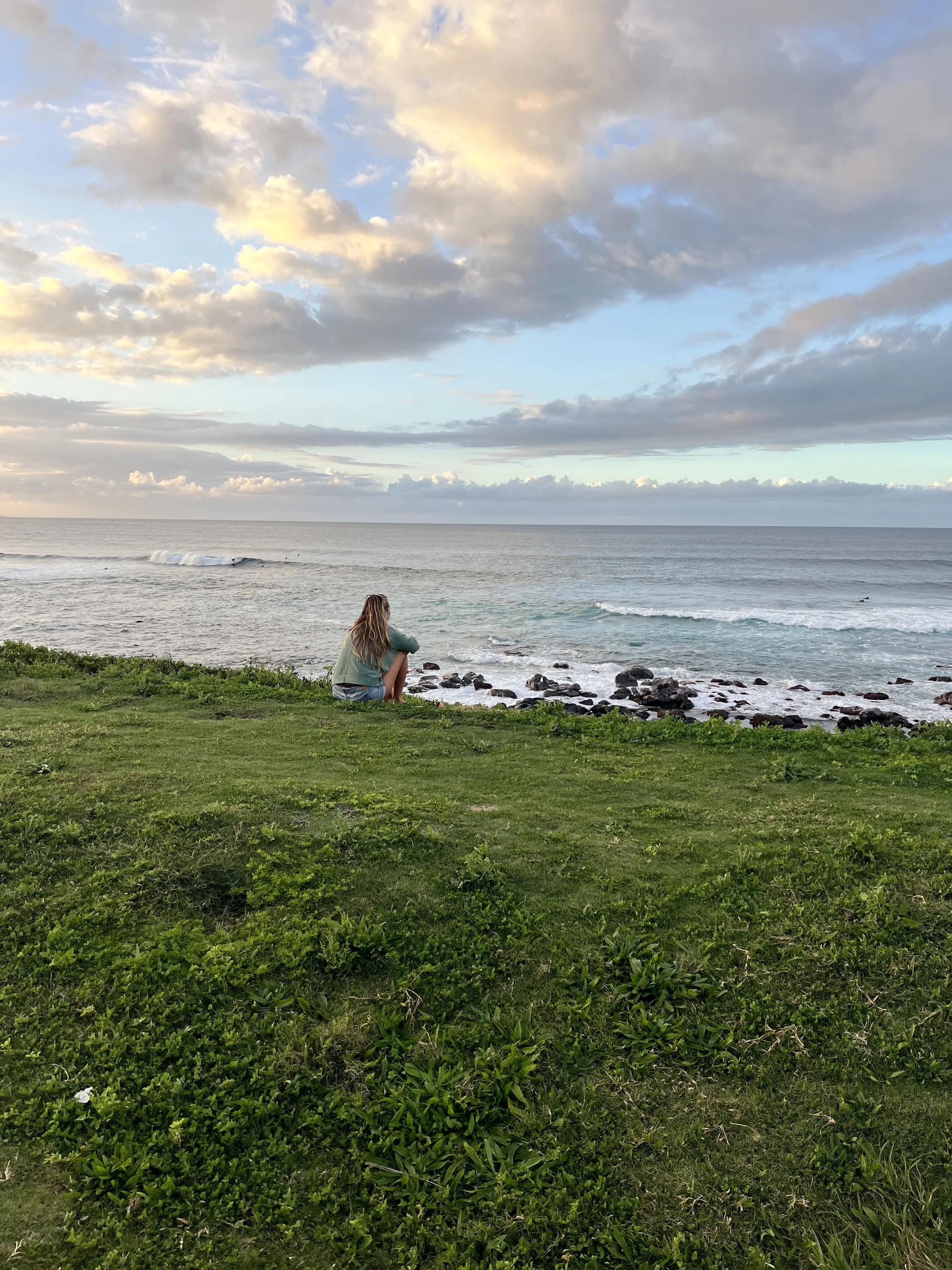 Bridget watching sunset at Ho’okipa Beach on Maui’s north shore