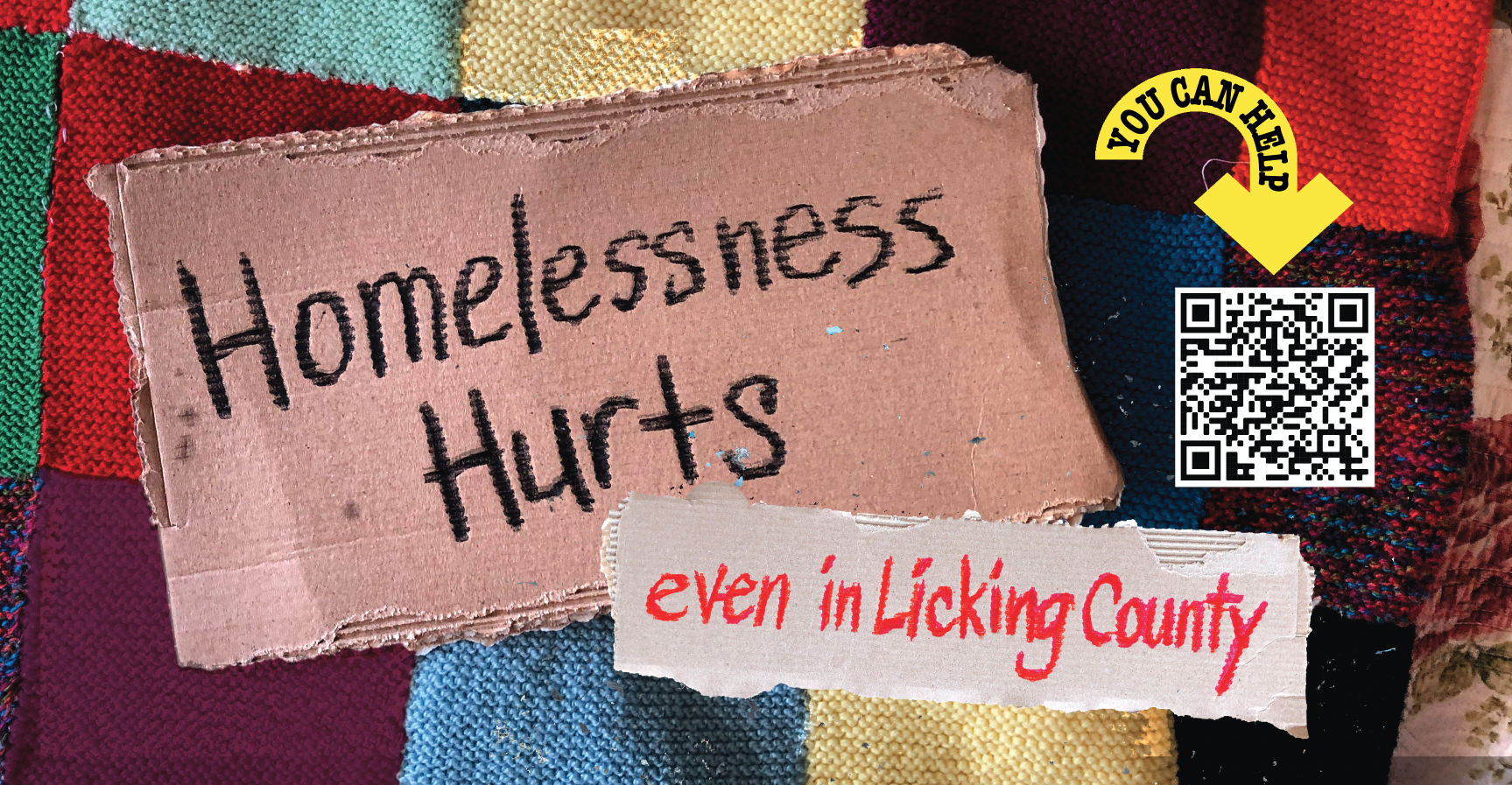 banner for homelessness hurts sign on cardboard on blanket