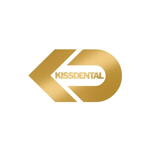 Gold and white logo with the words "Kiss Dental" inside a stylized letter D and an arrow pointing left.