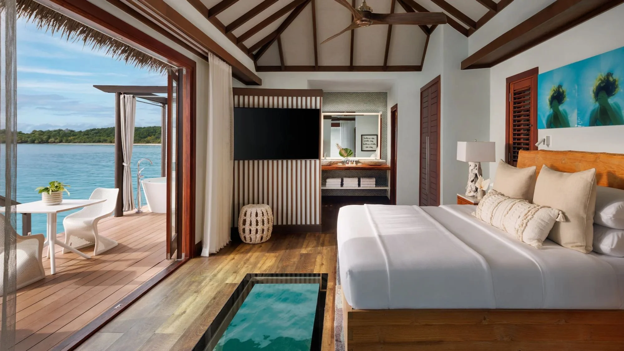 Overwater bungalows at Sandals Grande St. Lucian resort in St. Lucia