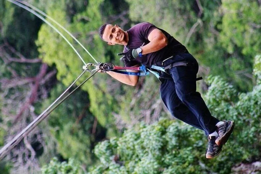 Man on zipline in St. Lucia