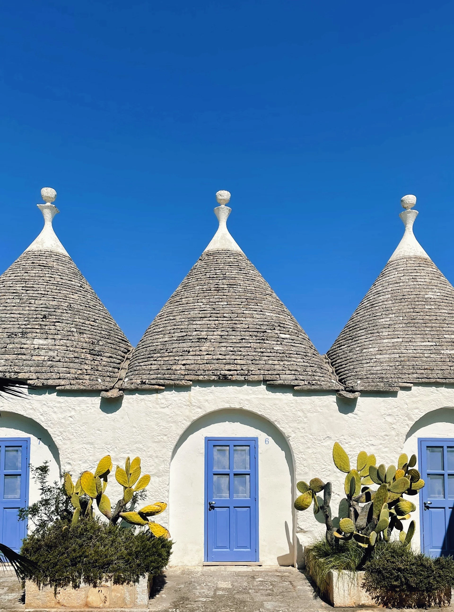 blue and white homes in Puglia, Italy