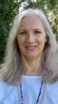 Regina doing Chakra Energy Balancing at Spirit Well Sensory Lounge in Florida.