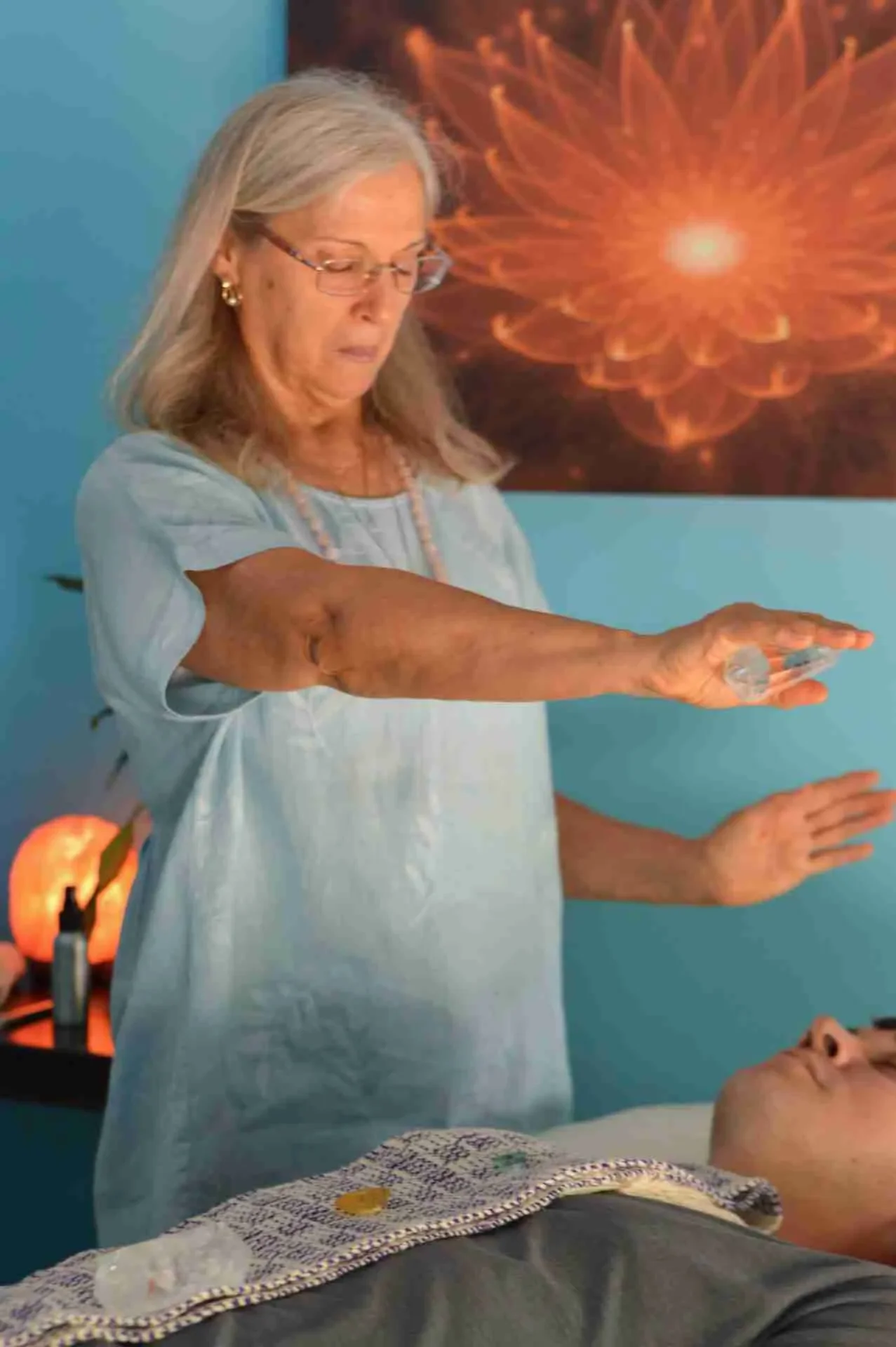 Regina doing Chakra Balancing at Spirit Well Sensory Lounge in Stuart, Florida.