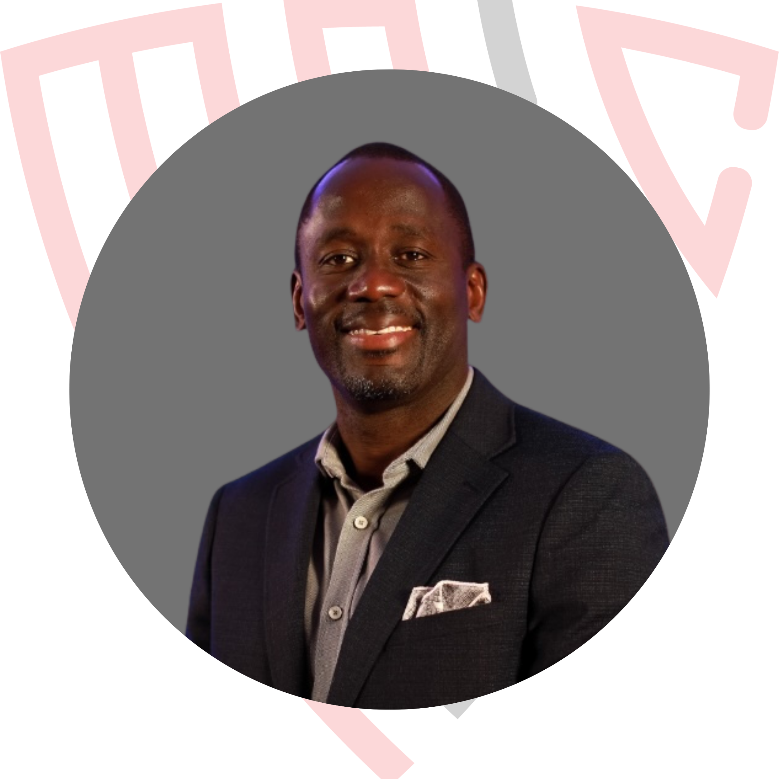 Portrait of a smiling man wearing a dark blazer, light-colored shirt, and pocket square, set against a gray circular background with a decorative red and white pattern behind.