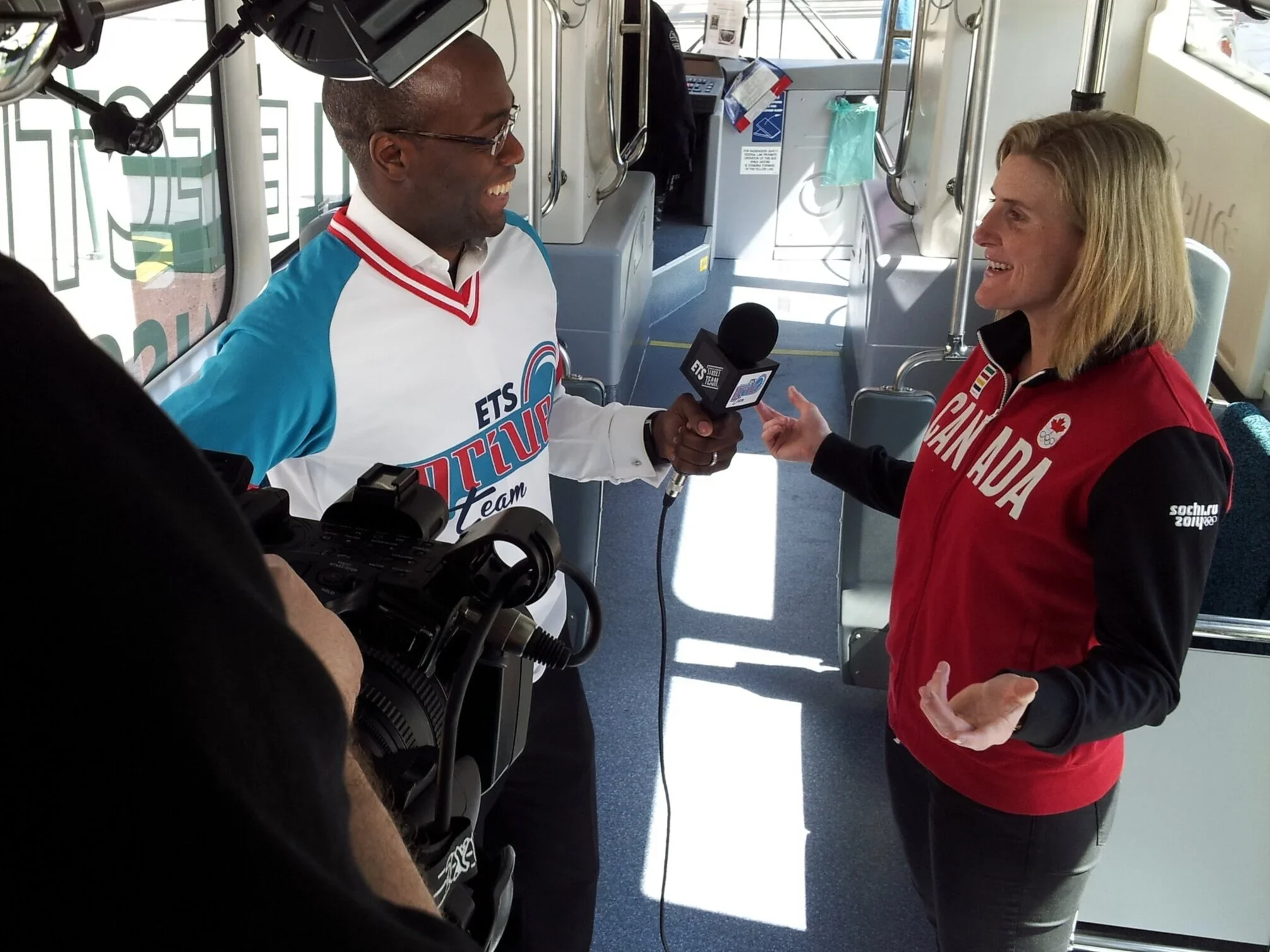 Nathan K. Walters interviewing Hayley Wickenheiser after the Sochi 2014 Olympics.