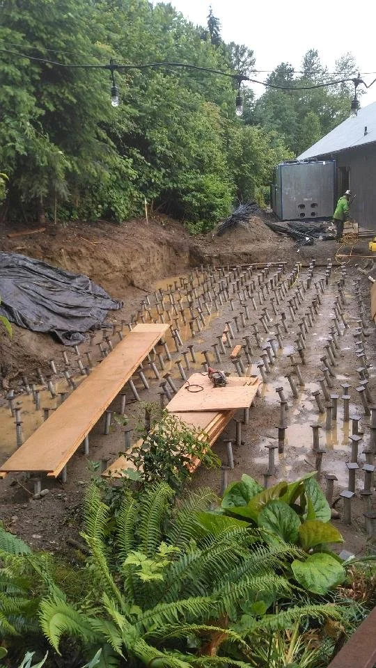 Ø6" Driven Pin Piles | Wilcox Construction | Woodinville Whiskey