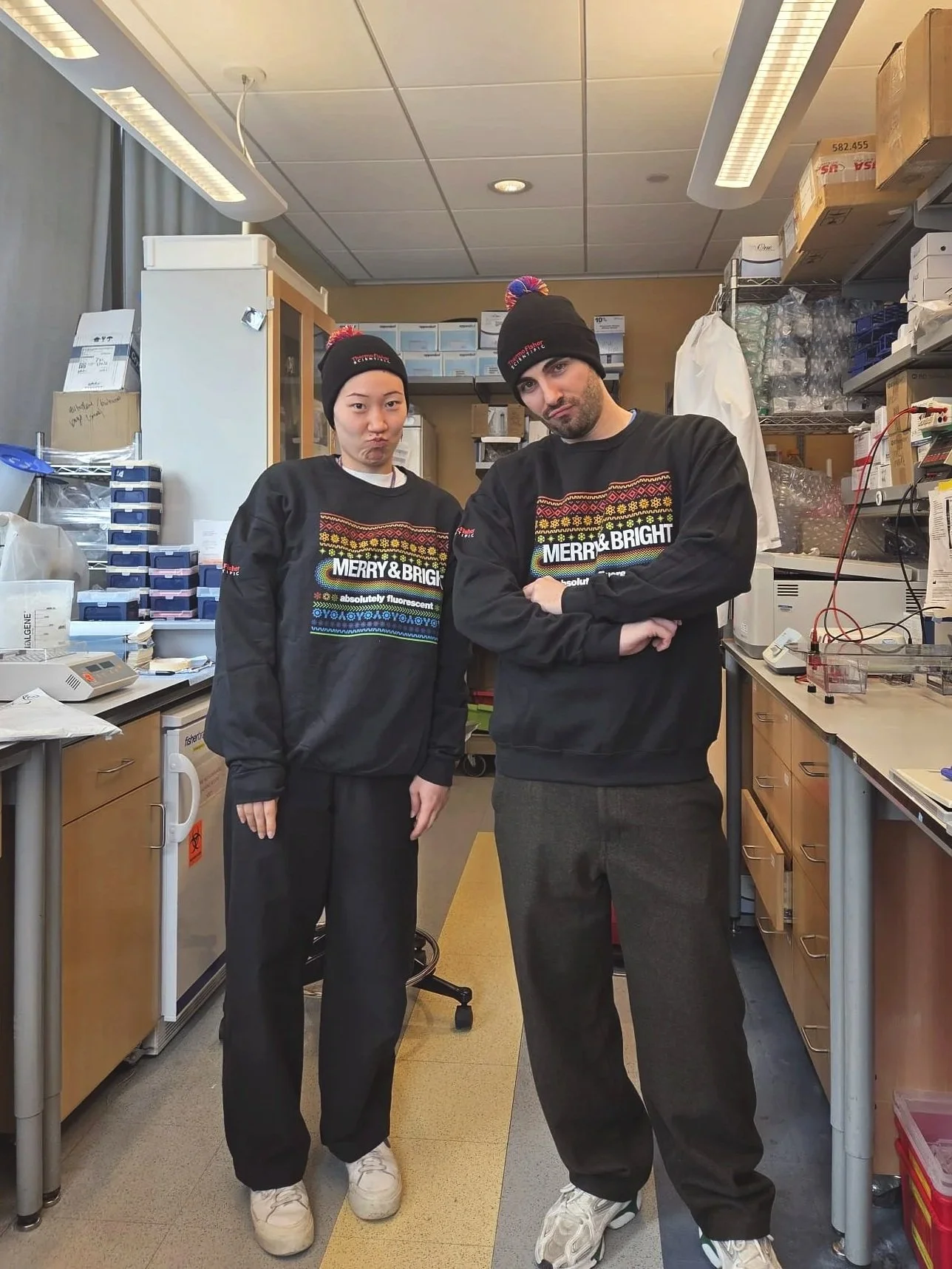 February 2026 - Alvaro and Katie rocking Thermo Fisher holiday promo sweatshirt and beanie