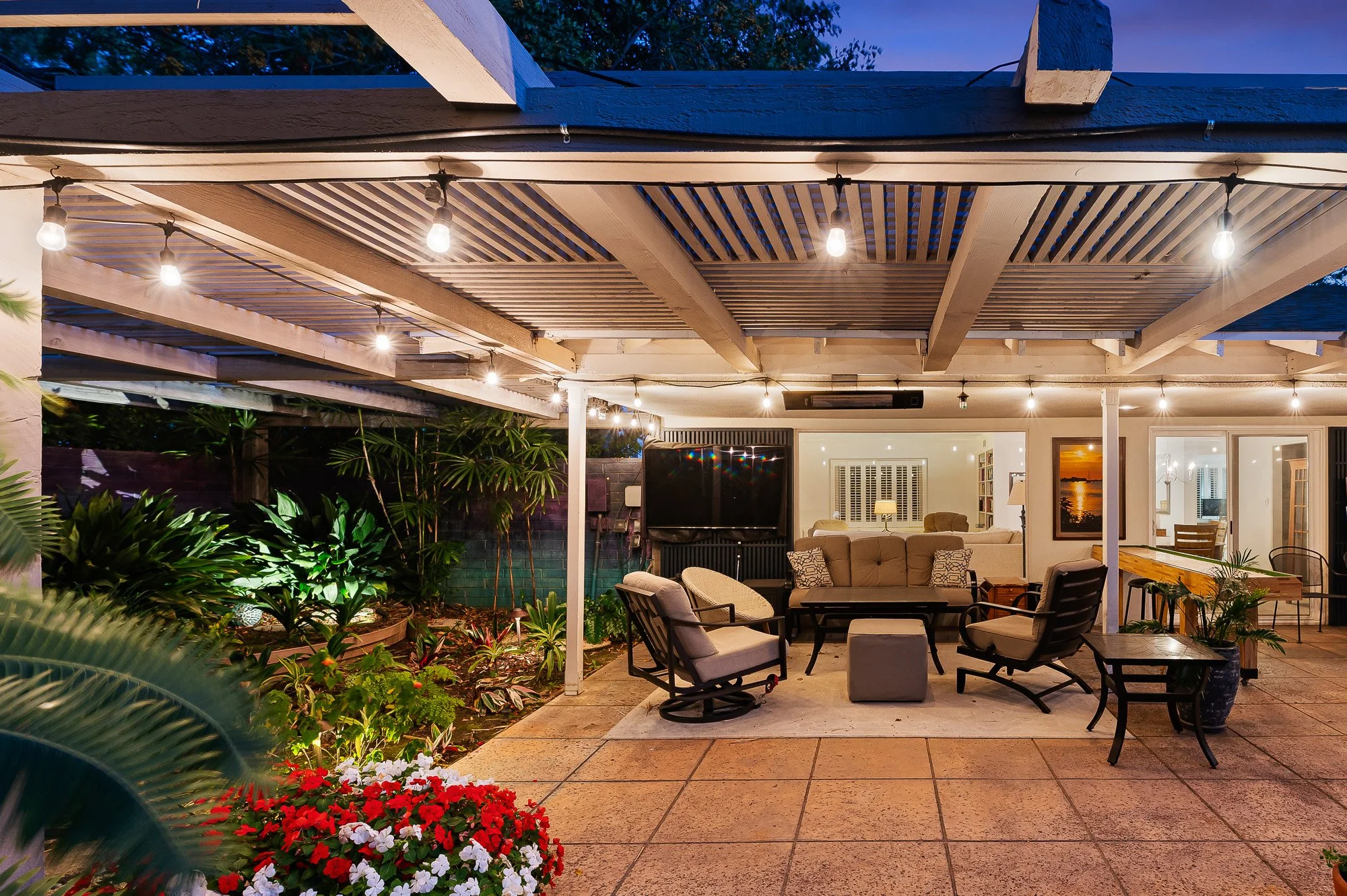 Twilight tropical outdoor lounge medium term rental Claremont CA SoCal Home Photo
