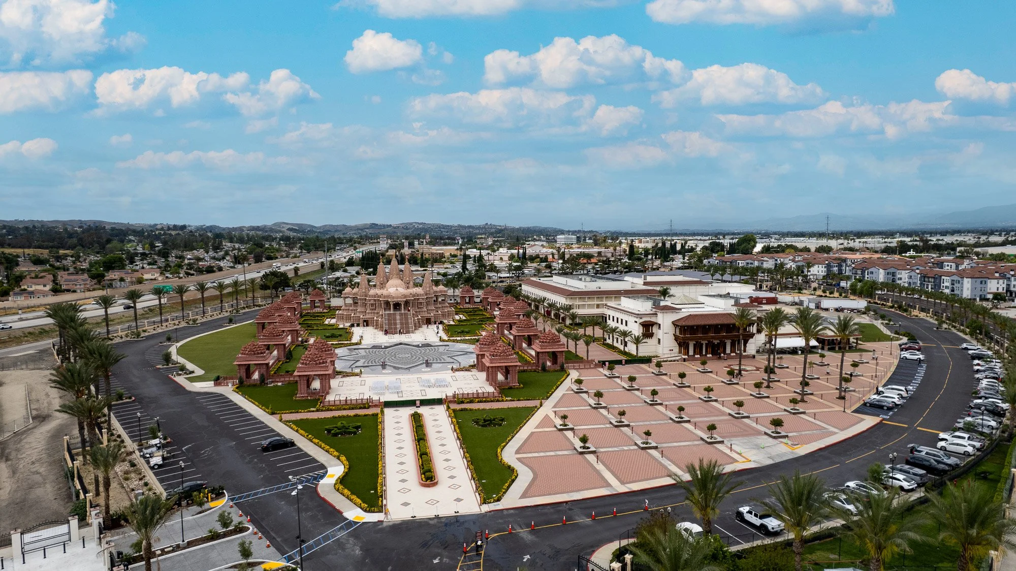 Aerial drone view of the BAPS Shri Swaminarayan Mandir in Chino Hills, California. Professional architectural and real estate drone photography in the Inland Empire by SoCal Home Photo.