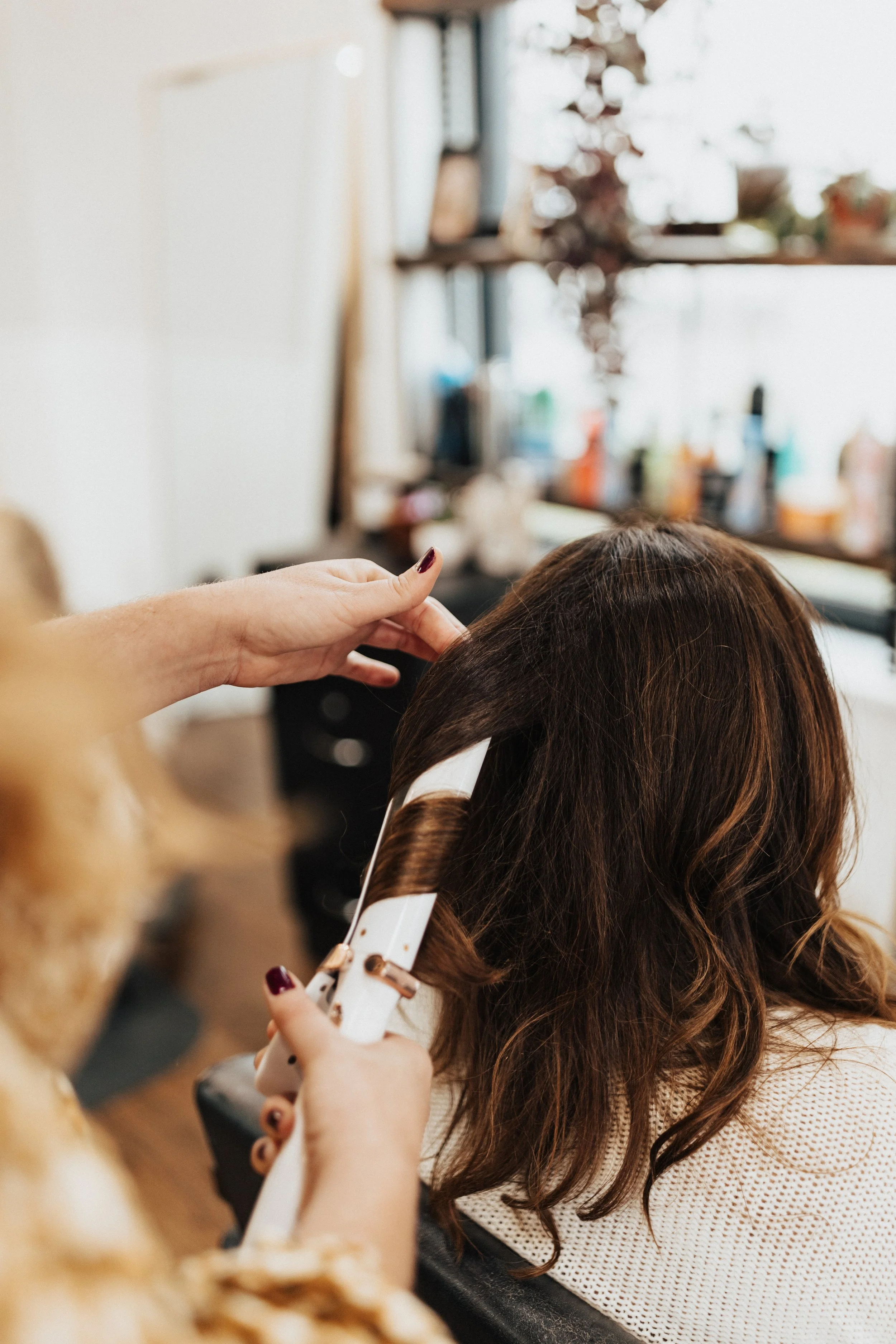 Client receiving hair, lash, and brow services at Paisley Moon salon in Milton, Delaware, known for thoughtful care and elevated results.