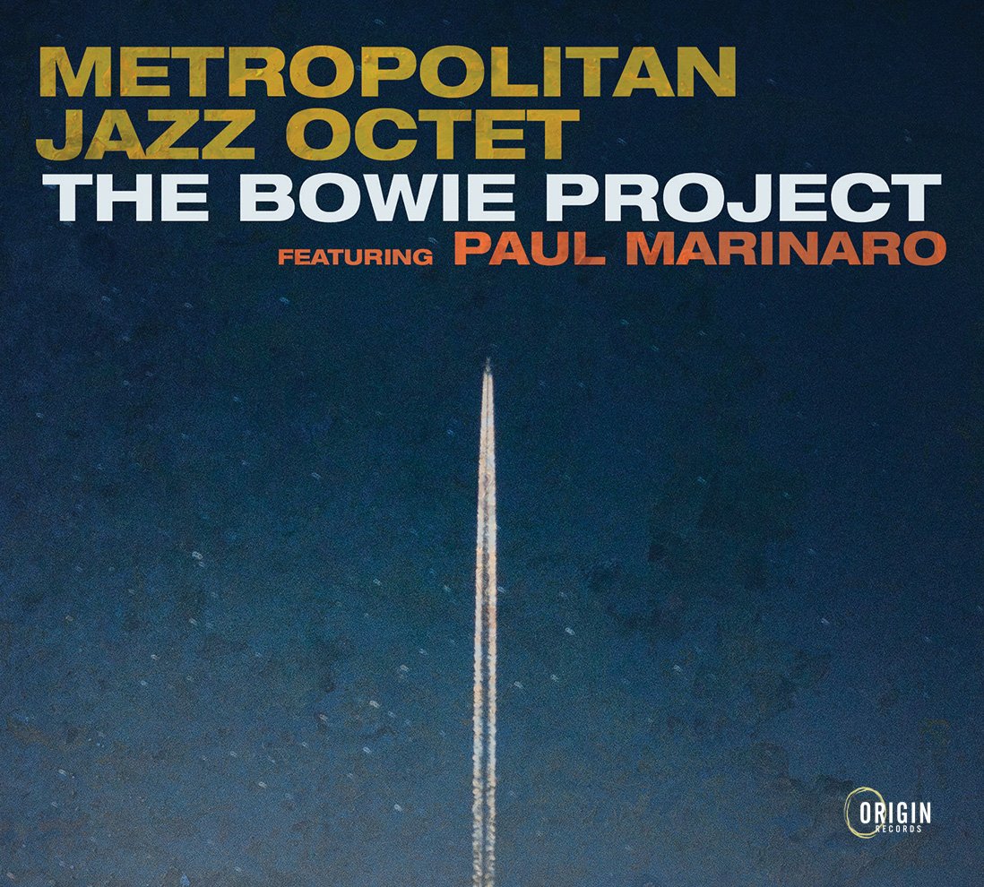 Album cover featuring the title "Metropolitan Jazz Octet: The Bowie Project" with the subtitle "featuring Paul Marinaro" and the record label "Origin Records" in the bottom right corner, with a starry night sky and a trail of a rocket or plane reaching upward.