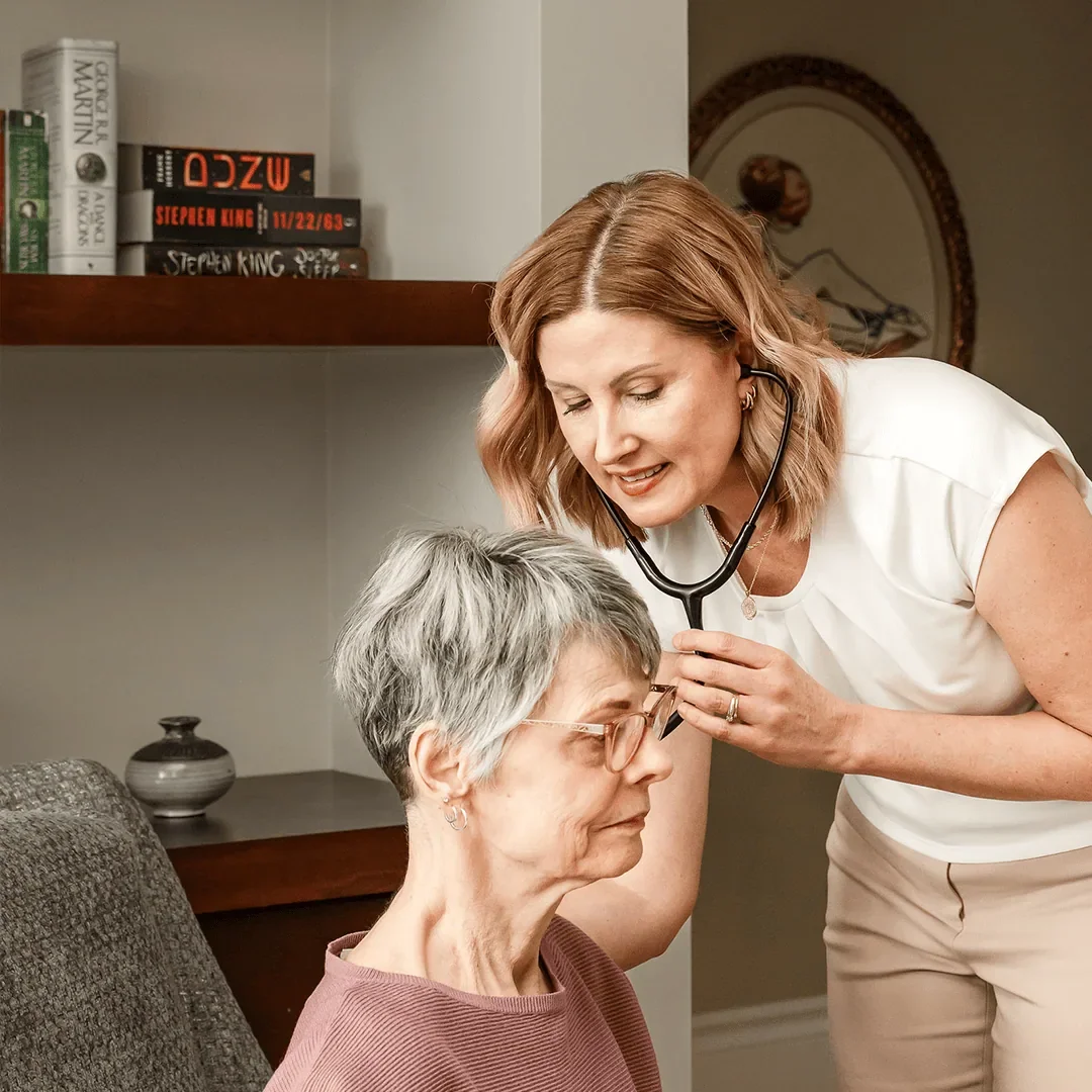 Compass Rose Care RN providing home care to a woman in Calgary