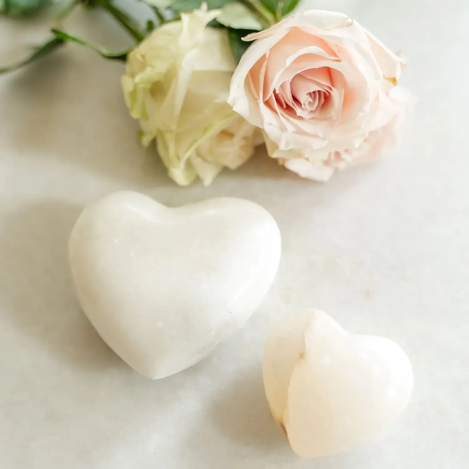 white stone heart and roses symbolizing respite care