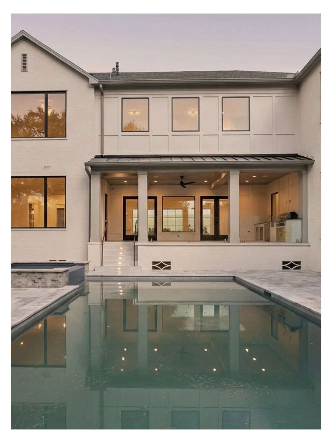 This home understands structure &mdash; symmetry along the pool, strong openings, marble with movement, oak left honest. It also understands context. A powder bath wrapped in Astros orange makes it clear: this isn&rsquo;t a generic build. It belongs 
