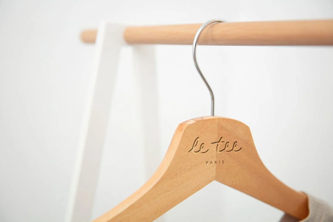 coat hanger branding position for clothing company le tee paris