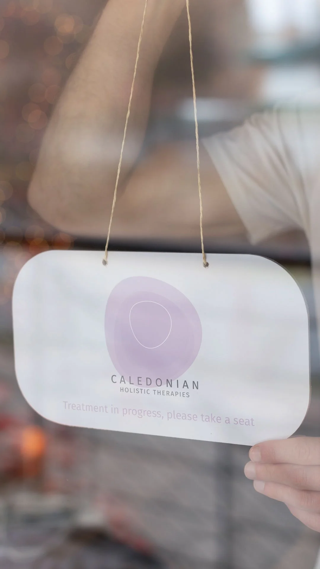 branding and simple door sign design for holistic therapy business in scotland