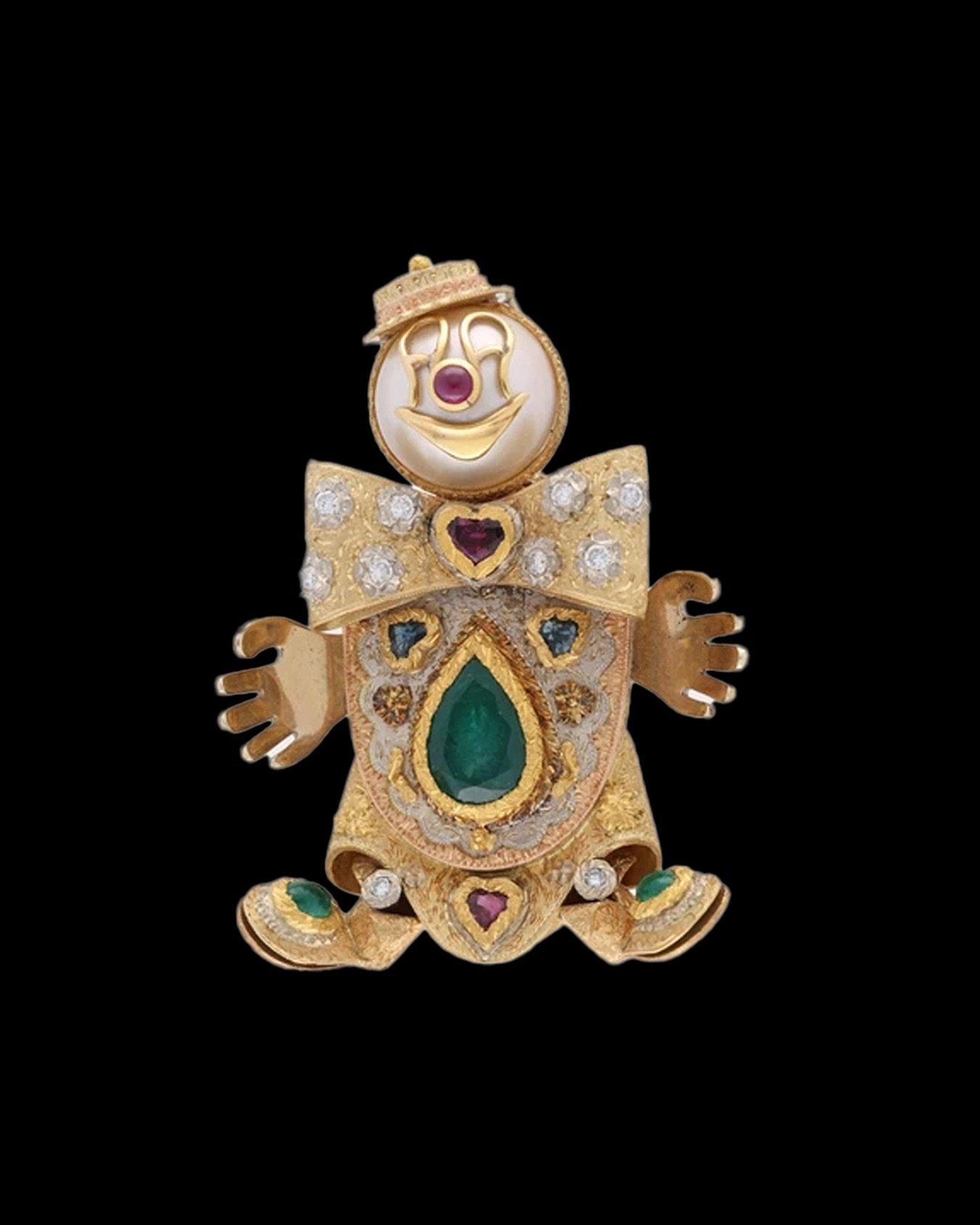 Diamond Clown Pendant / Brooch
18k (750) gold &amp; diamonds totaling 0.60 carats, rubies totaling 1.45 carats, sapphires totaling 0.53 carats, emeralds totaling 7.23 carats, cultured shell pearl, length 68 mm.
Weight 62.8g.