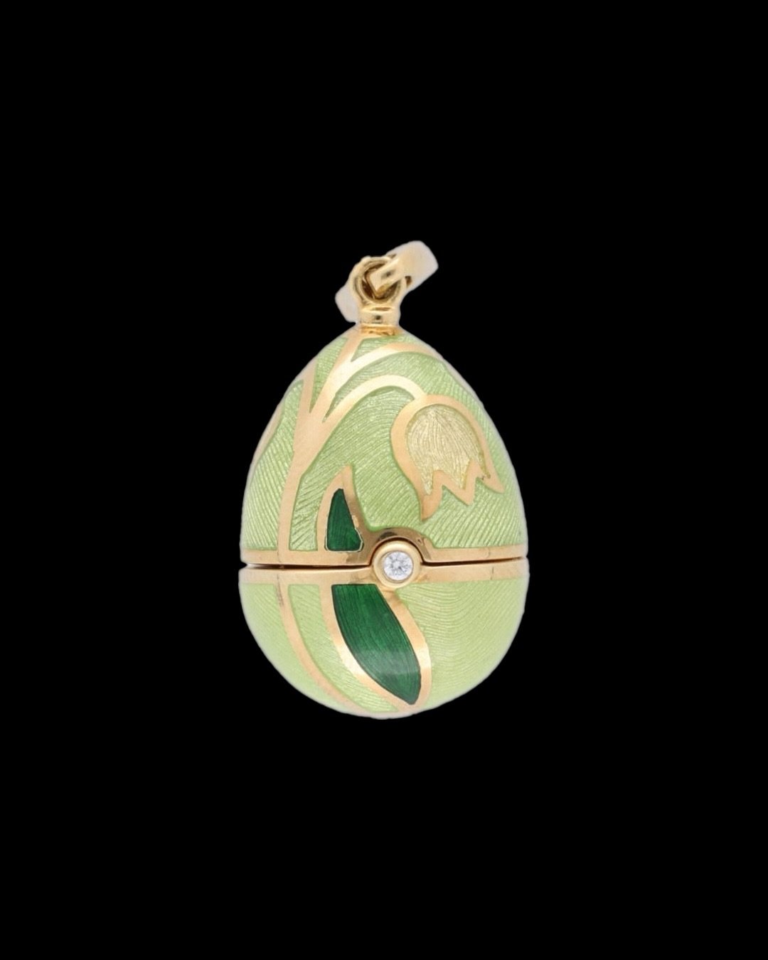 Faberge Egg Pendant. A limited edition of Vector Mayer Collection since 1960, but never used ,  18cts gold, diamond n light green enamel, it opens to reveal a gold enamelled cat. weight 17.6 g.