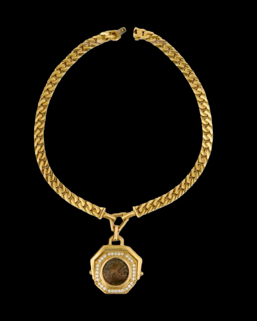 Rare Bulgari Necklace &ndash; 18K Gold with Roman Coin &ldquo;VHCIA&rdquo; (155&ndash;120 BC), Hexagonal Medallion Design

Crafted in 18K gold, this exceptional piece features an original Roman coin &ldquo;VHCIA&rdquo; (155&ndash;120 BC), set within 