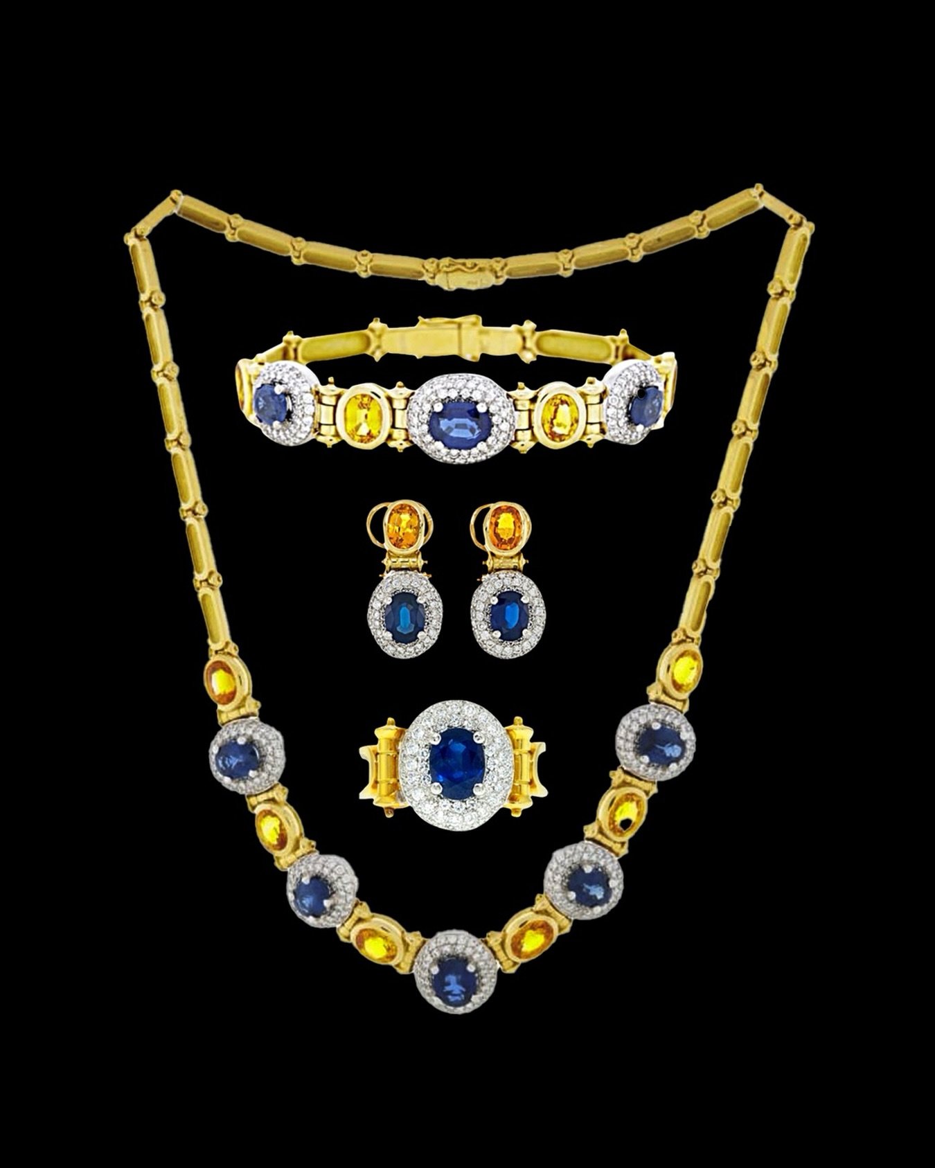 Natural Diamond, Blue &amp; Yellow Sapphire Set
18k gold necklace, bracelet, earrings
&amp; ring.