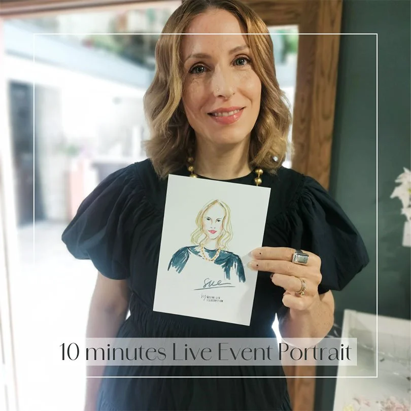 A short-wavy-haired lady wearing a navy dress, holding a personalised fashion portrait illustrated by Siya Liu at a live event.  