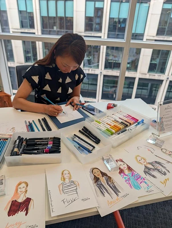 Live event illustrator Siya Liu working at NatWest Event in Leeds, drawing event guests portraits.