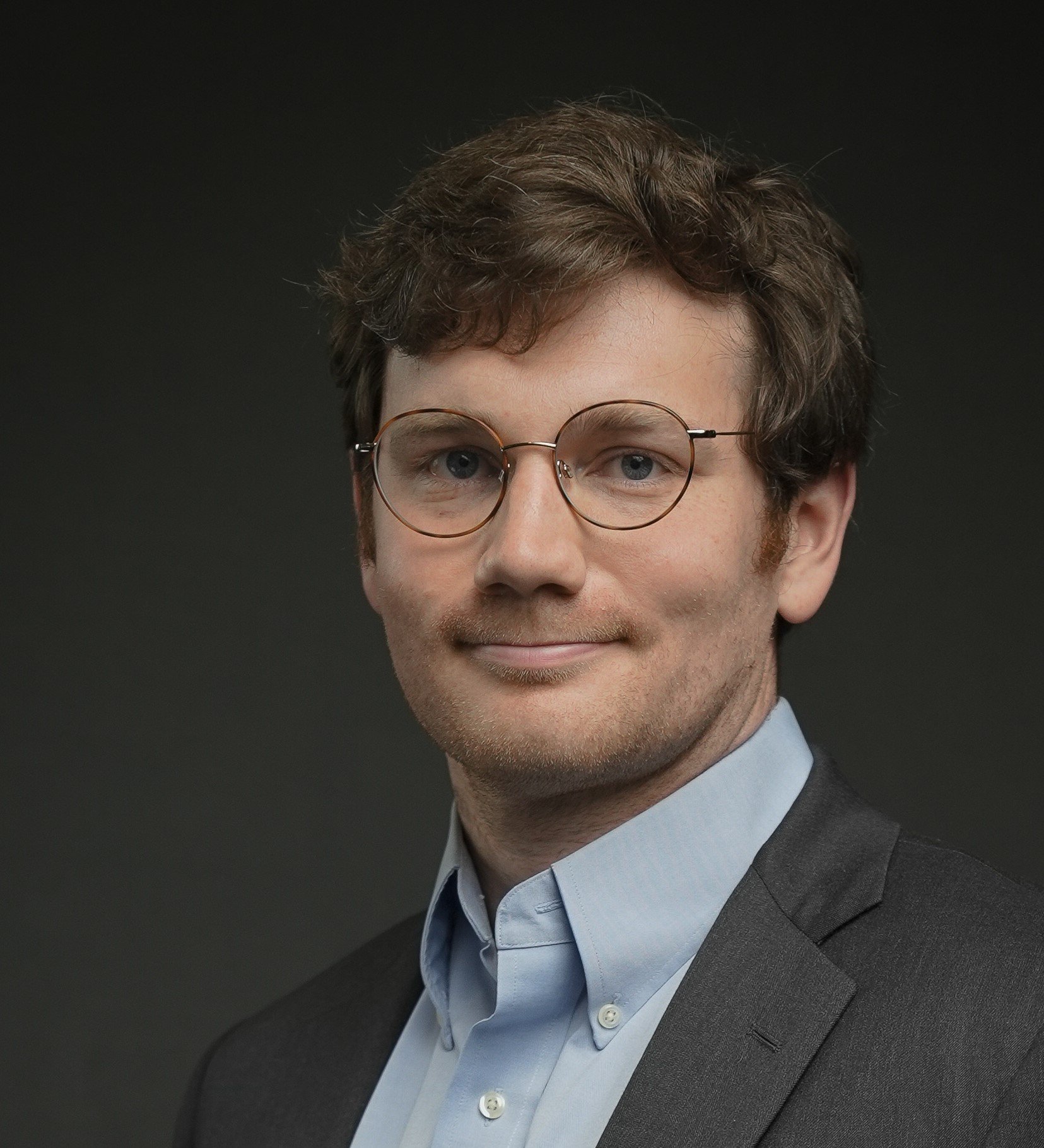 headshot of John Michael Falligant