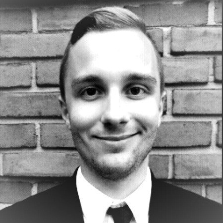 a headshot of Ryan Benson