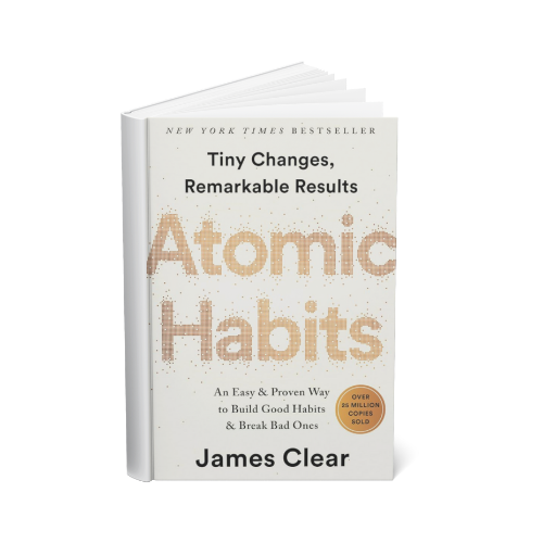 Book titled "Tiny Changes, Remarkable Results" by James Clear, with a subtitle "Atomic Habits" and a sticker stating "Over 5 million copies sold."
