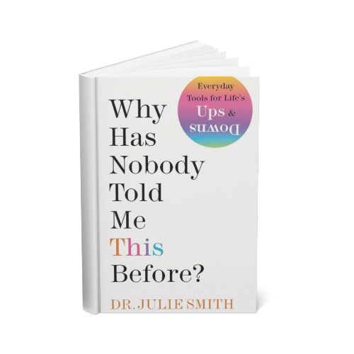 A book titled "Why Has Nobody Told Me This Before?" by Dr. Julie Smith, with a circular rainbow-colored sticker that reads "Everyday Tools for Life's Ups & Downs."