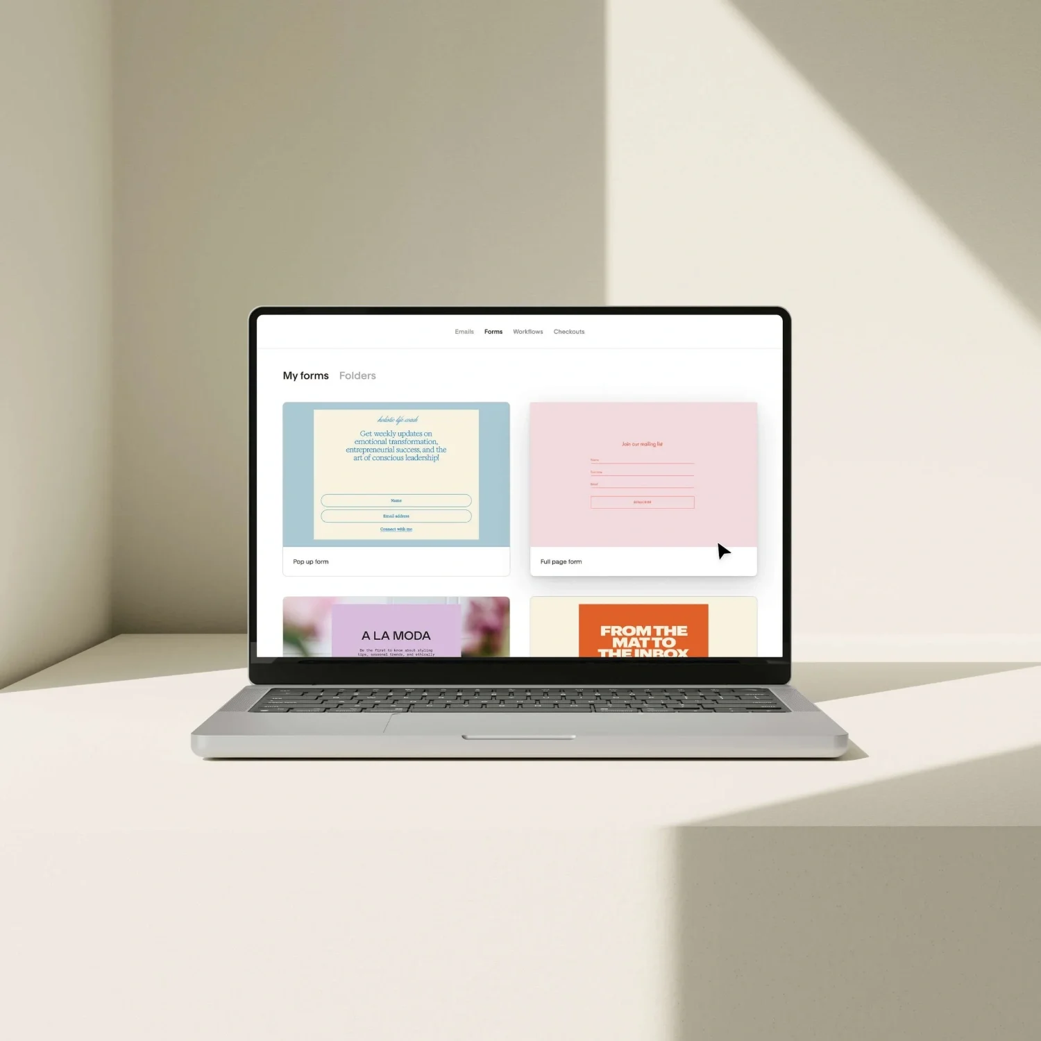 An open laptop showing the "Forms" page of Flodesk.