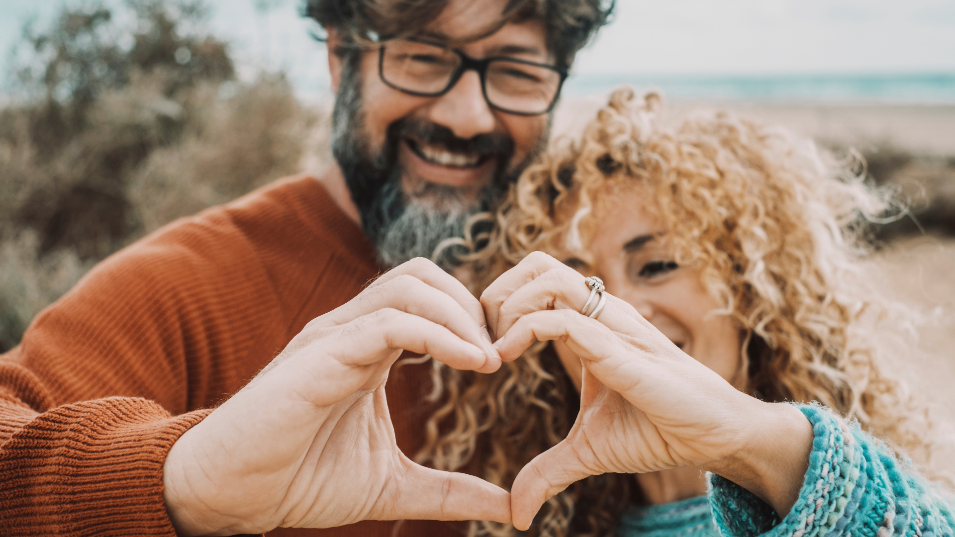 Middle Age Couple Heart Hands