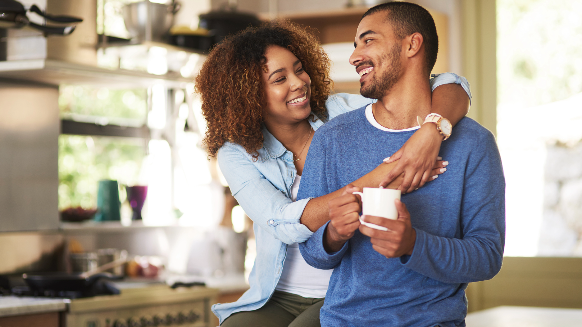 couple at home in kitchen