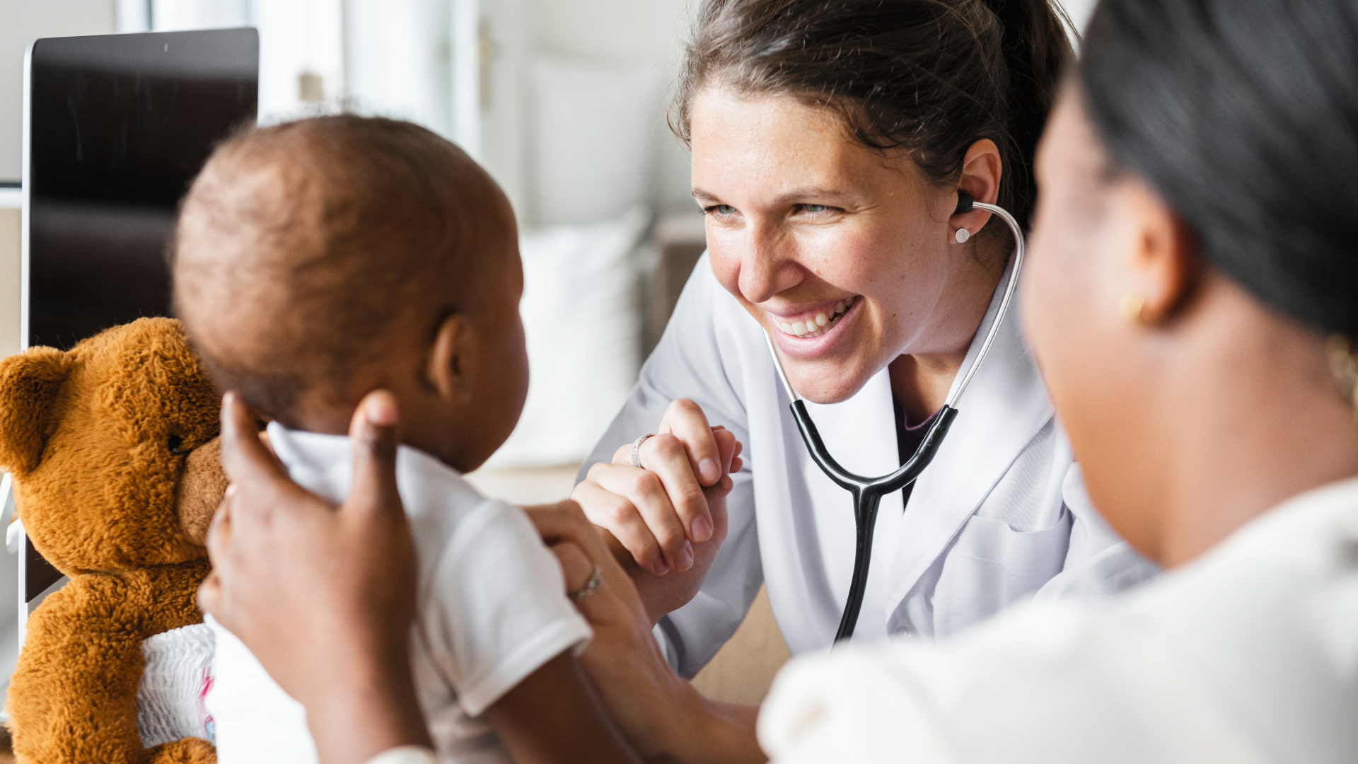 pediatrician seeing a child patient