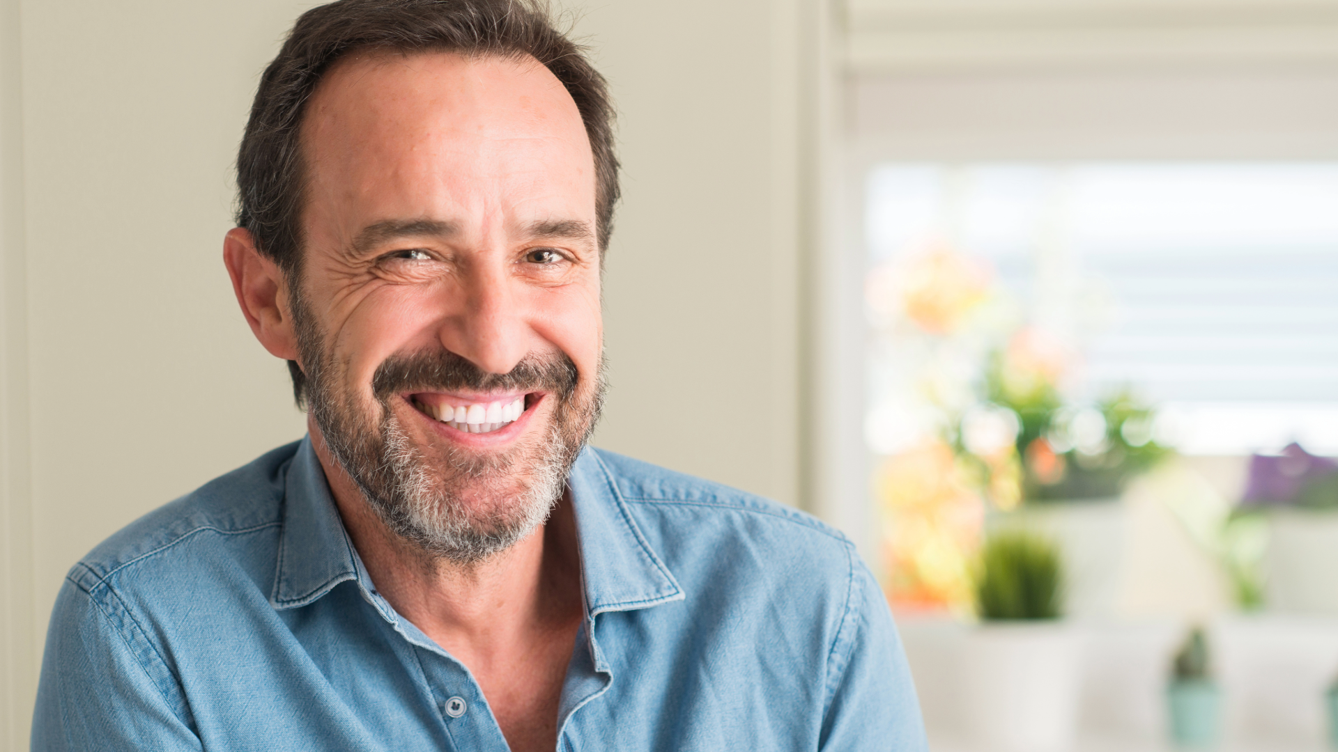 man with beard smiling