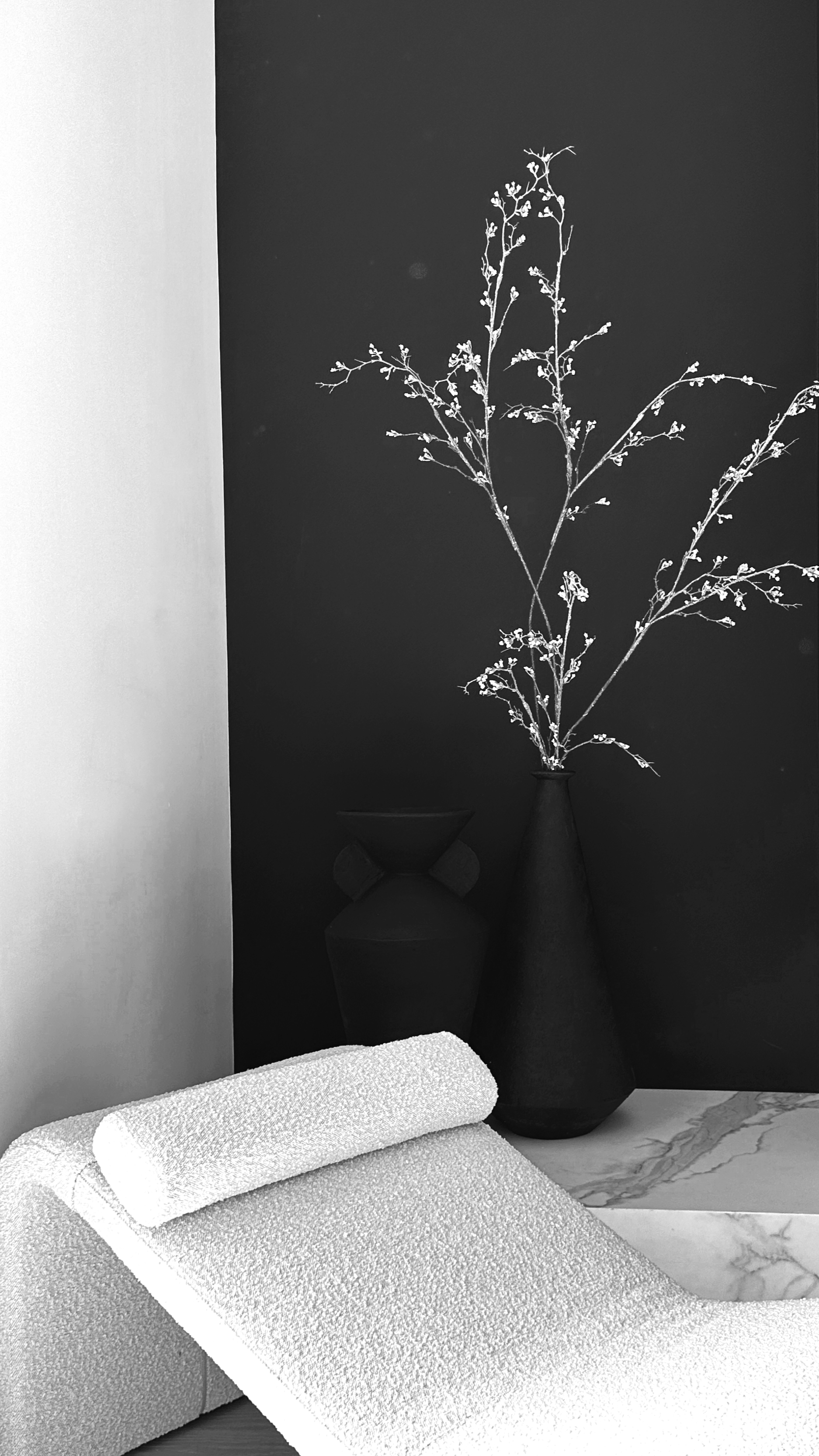 Ne Nu Studio - Vignette of branches, marble, chaise. Interior Design.