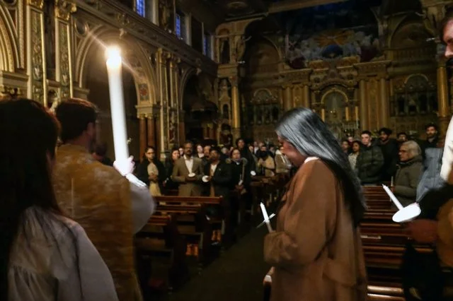 The Pascal candle is processed in the aisle