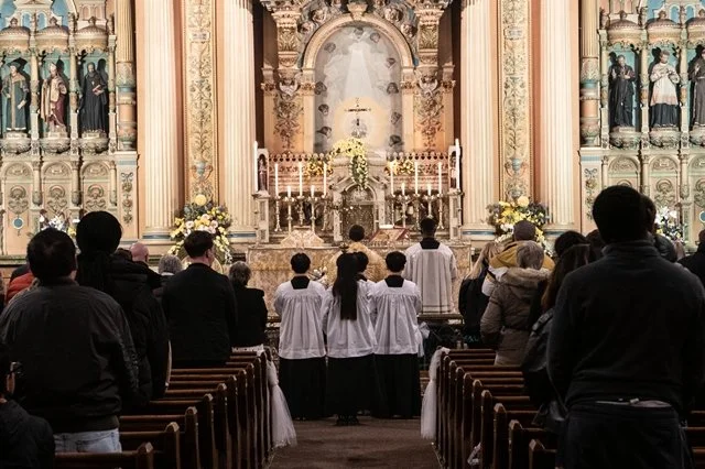 Priest and servers faced the altar.