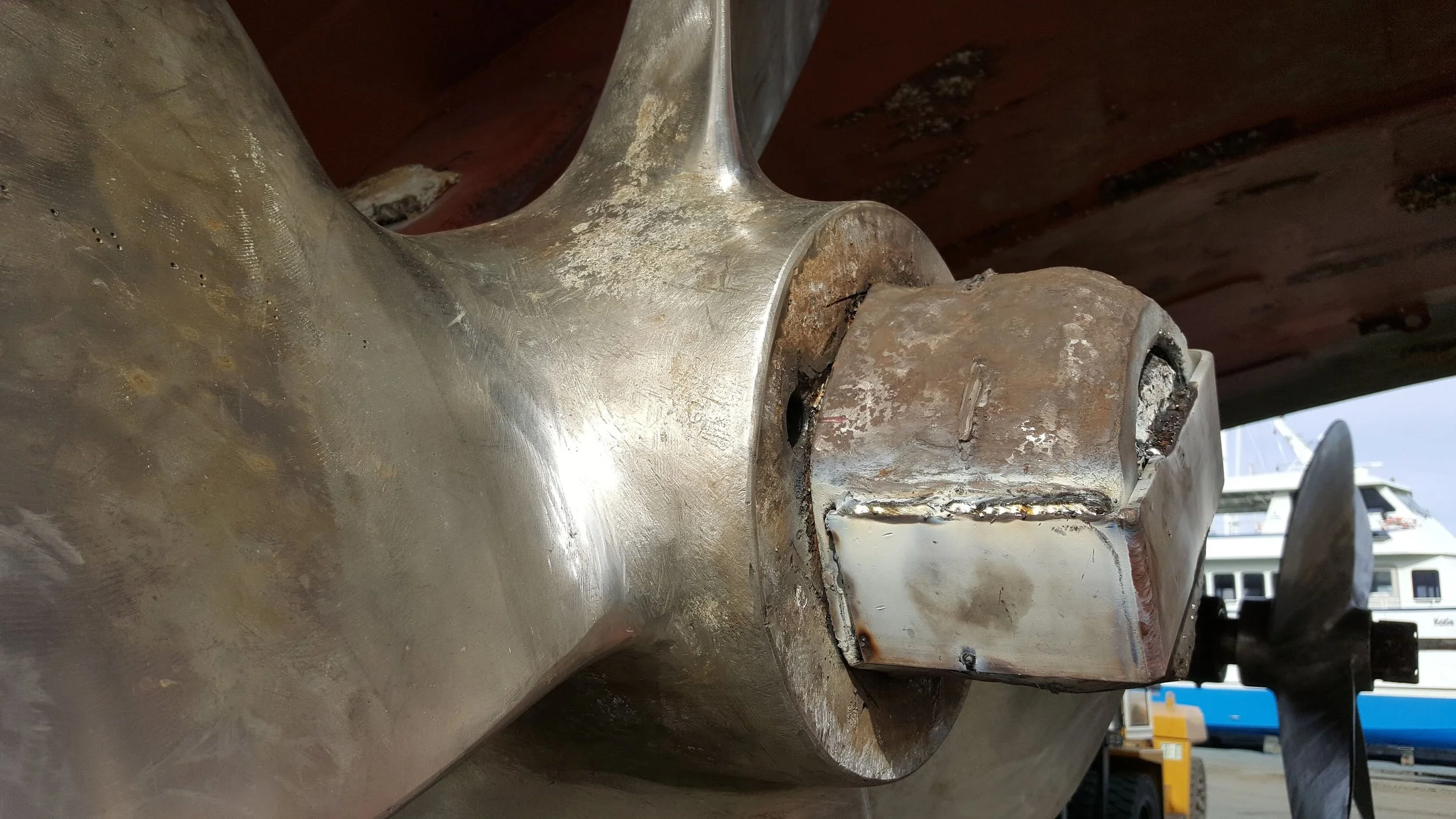 QA inspection on prop nut retaining clip on a commercial vessel during a drydock refit directed by KEY Marine Advisors