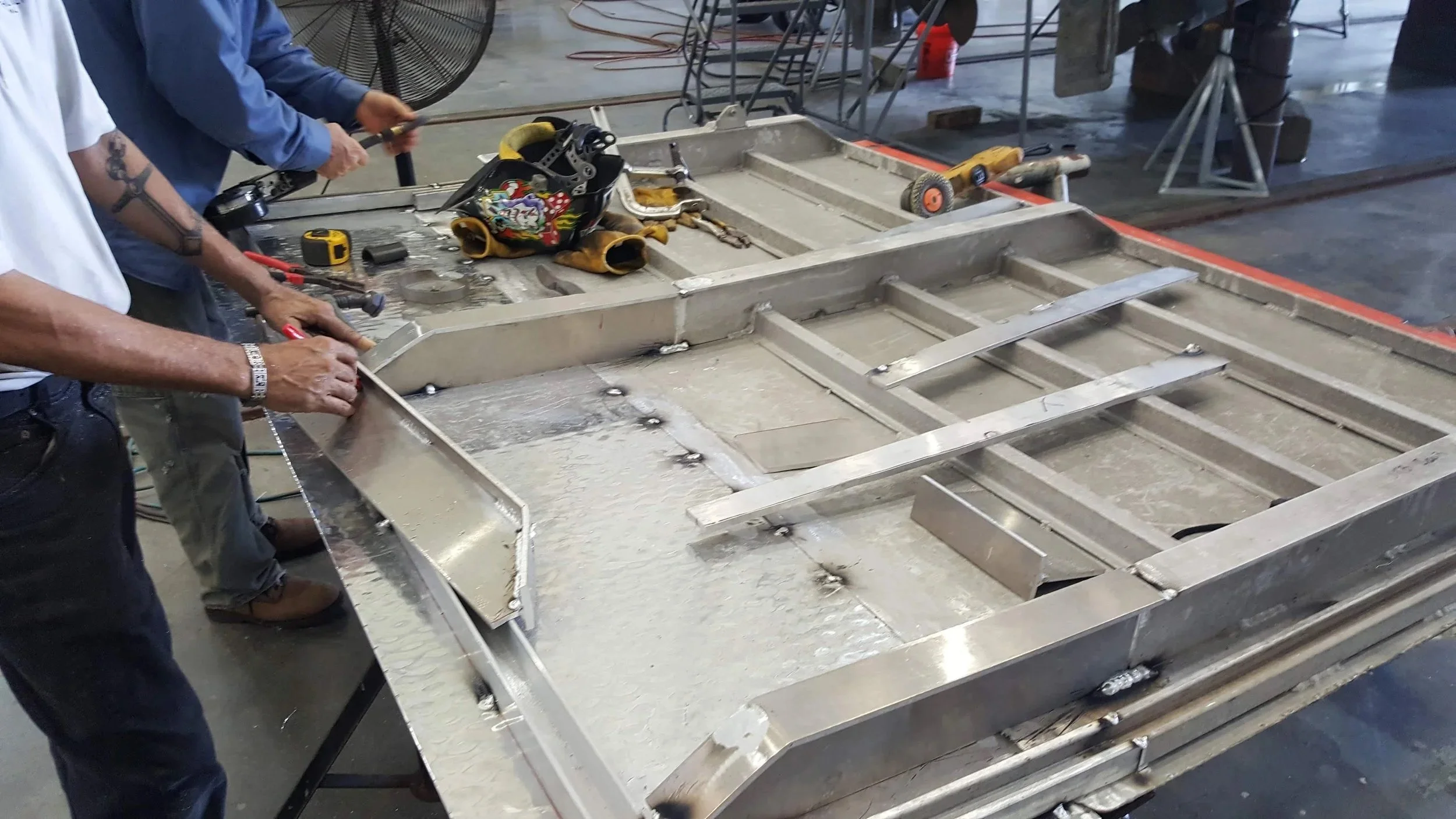 A marine metal fabricator is undertaking modifcations on an aluminum deck hatch for one of KEY Marine Advisors U.S.-based commerical clients.