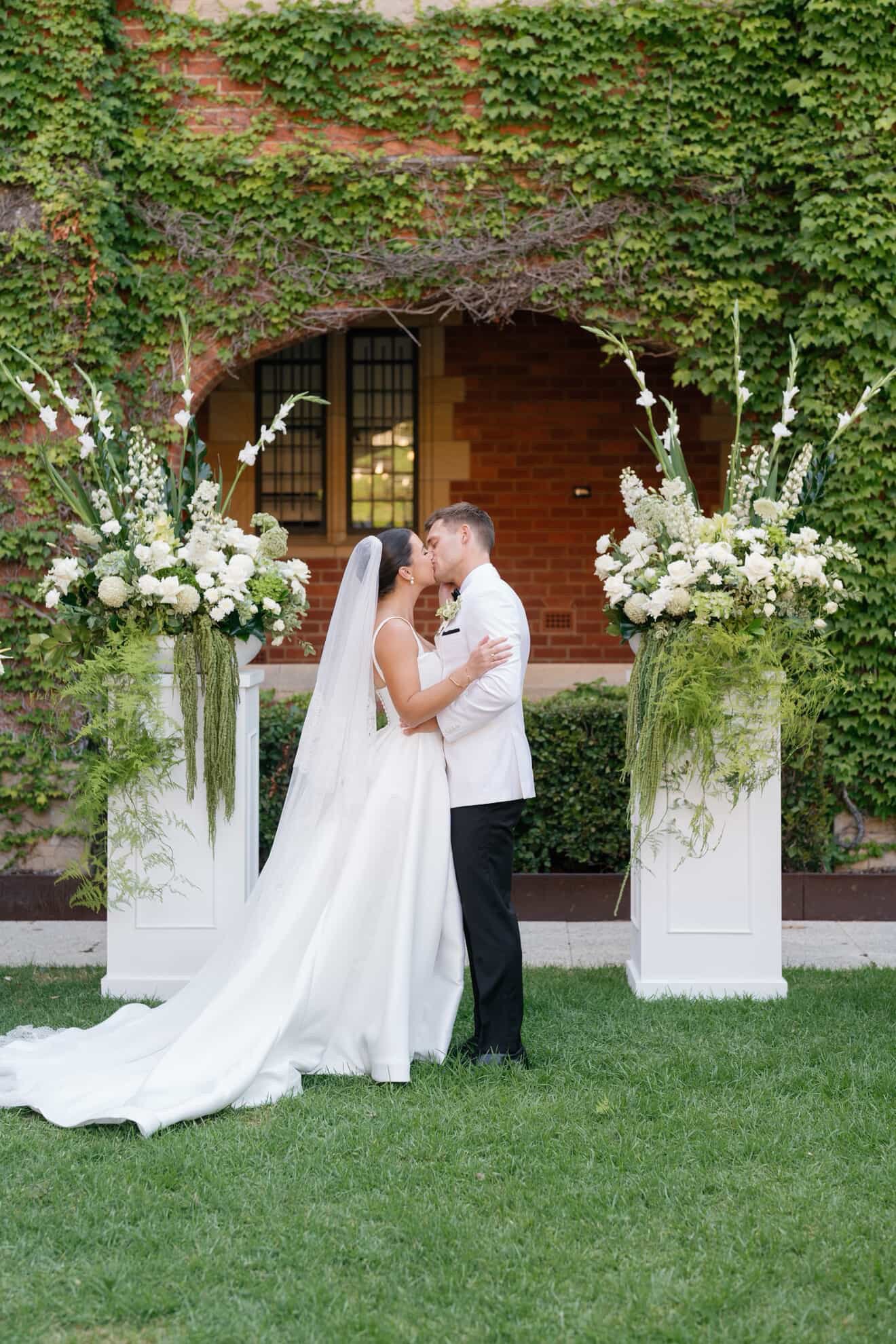ceremony plinths with couple kissing BB1D9609-BD2B-44A4-A070-185B00E4B39B.JPG