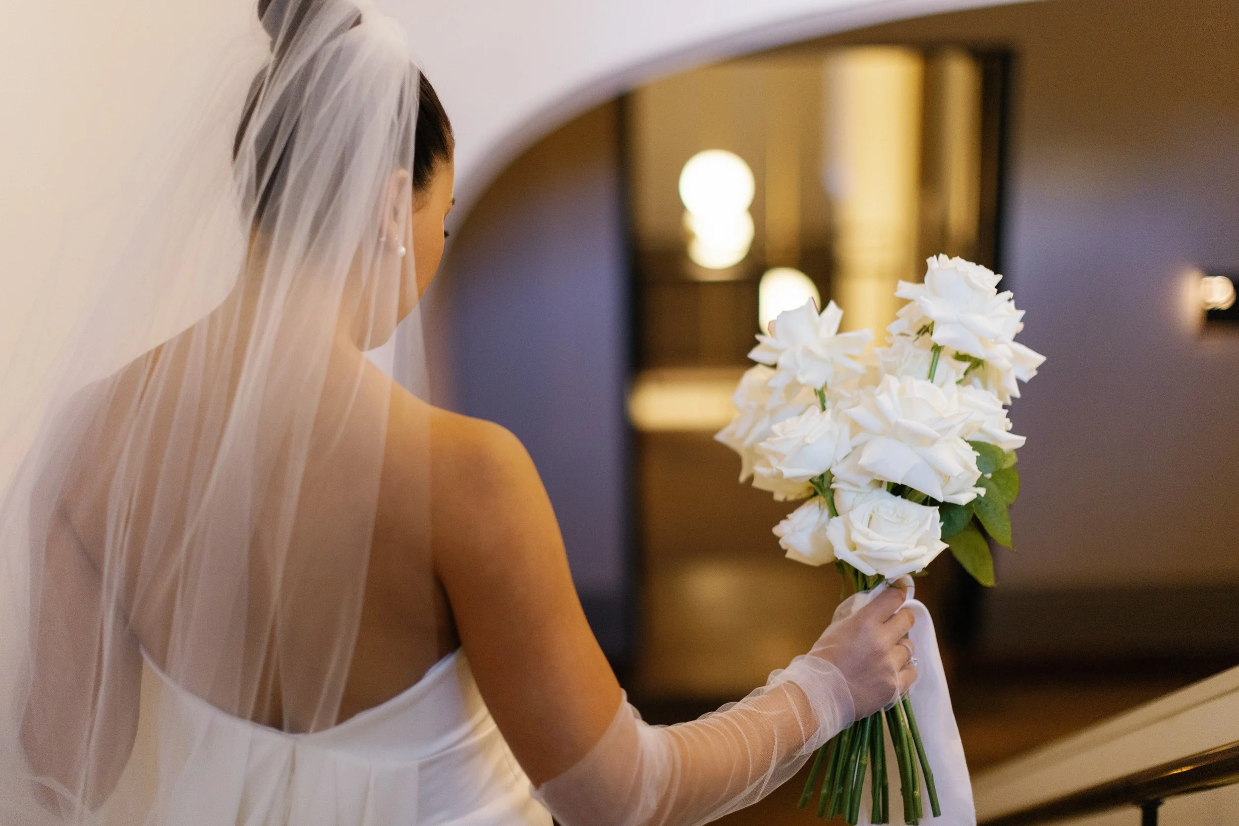 Jo with bouquet form behind J&D_Sammy&Tom-229.jpg
