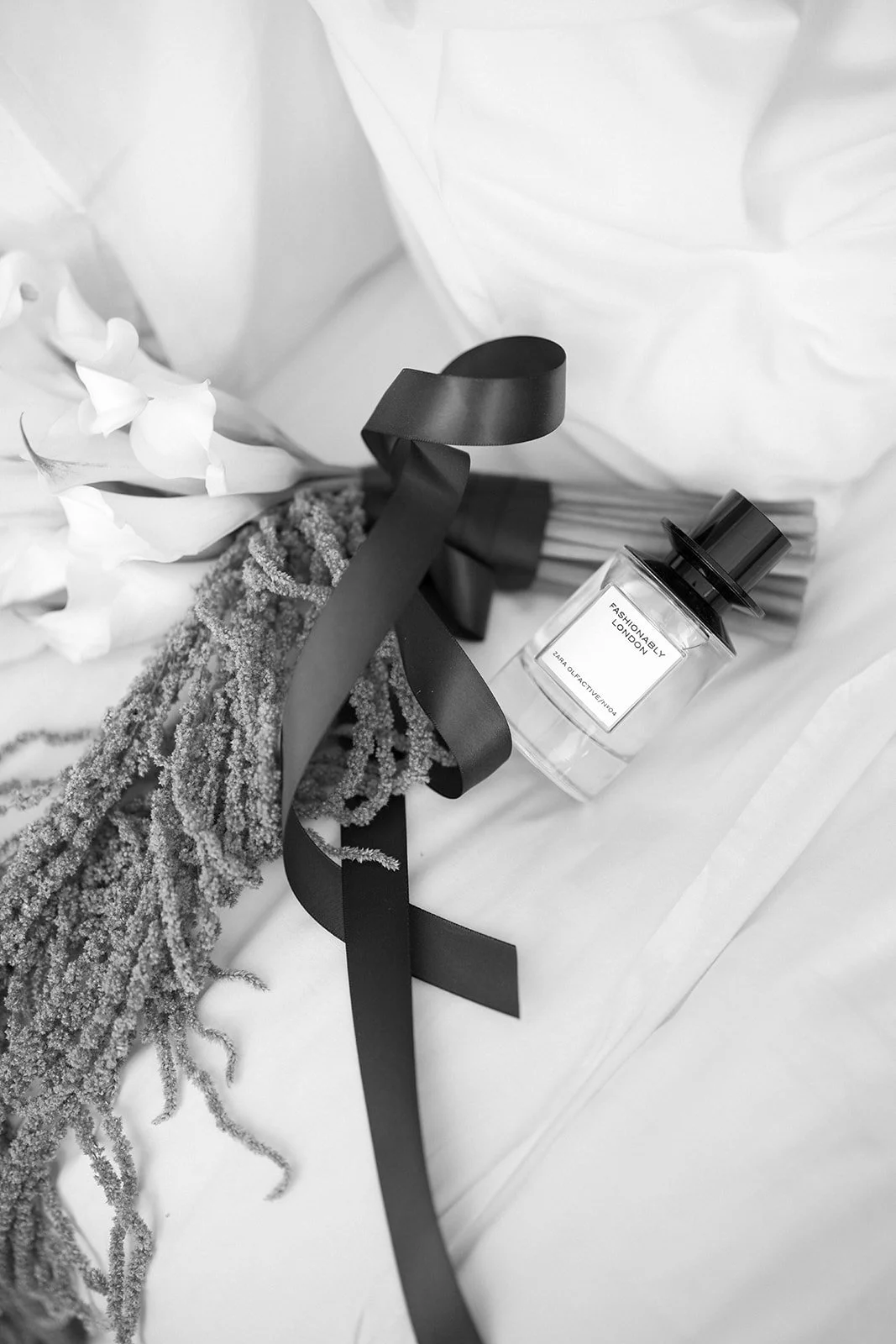 bouquet and perfume in bed B&W AL-P-2_websize.jpg