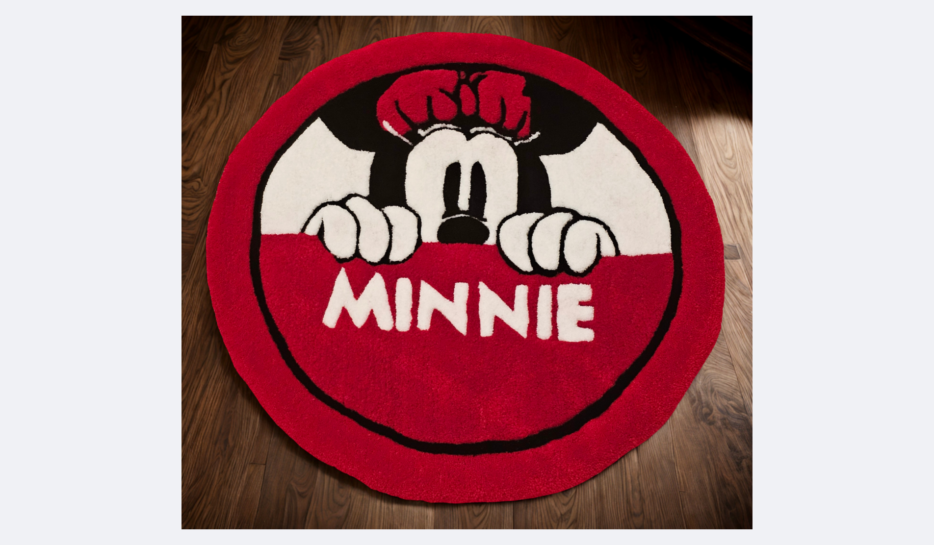 Round rug with a design of Mickey Mouse peeking over a red and white background, with the word "Minnie" written in white below. The rug has a red border and is on a wooden floor.