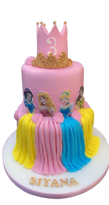 A pink princess-themed birthday cake with a golden crown and the number 3 on top, featuring fondant images of Disney princesses Rapunzel, Aurora, Cinderella, and Ariel draping down the sides. The base has the name 'SIYANA' written in gold.