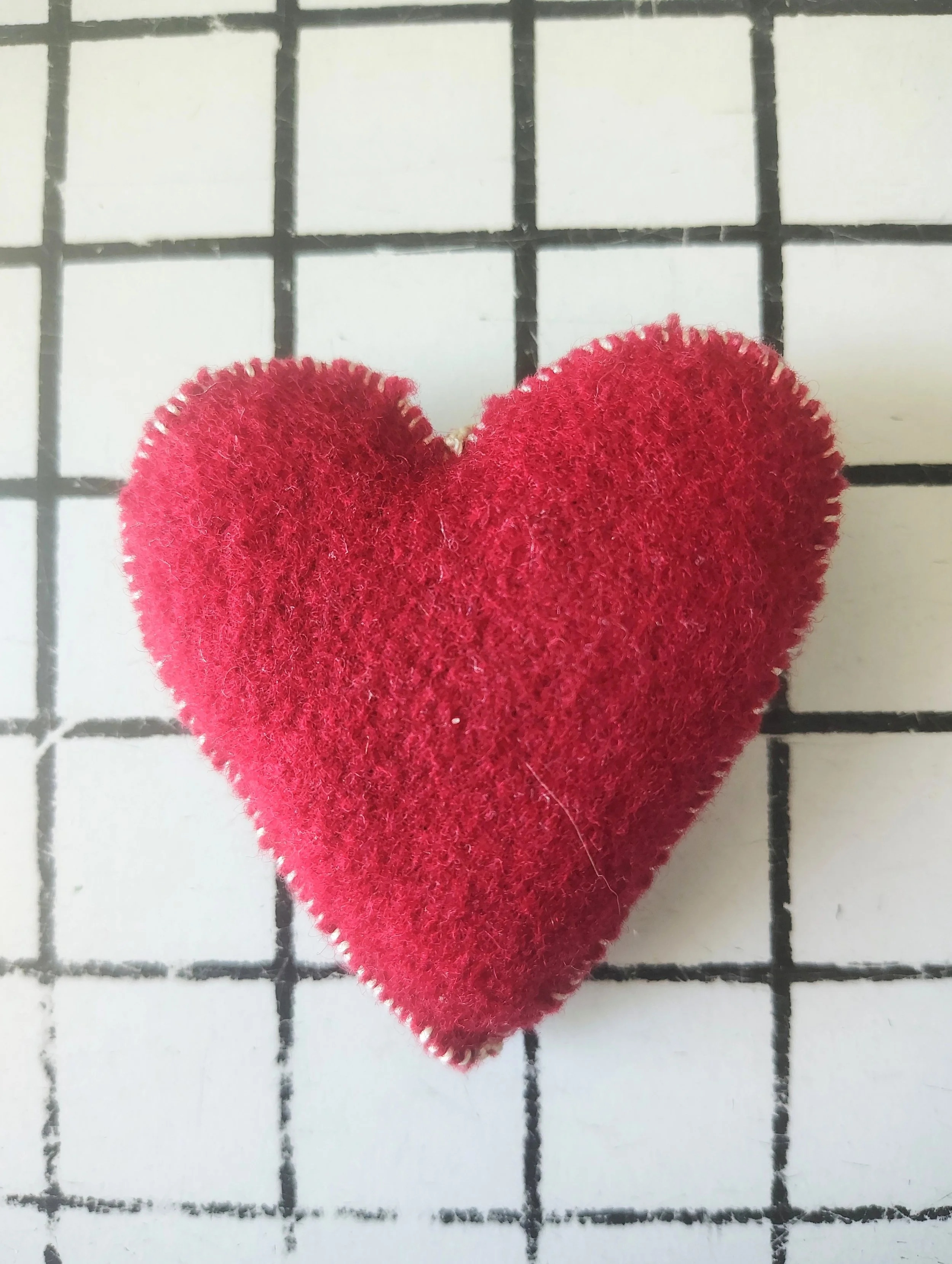 Heart Pincushion WhipStitching.jpg