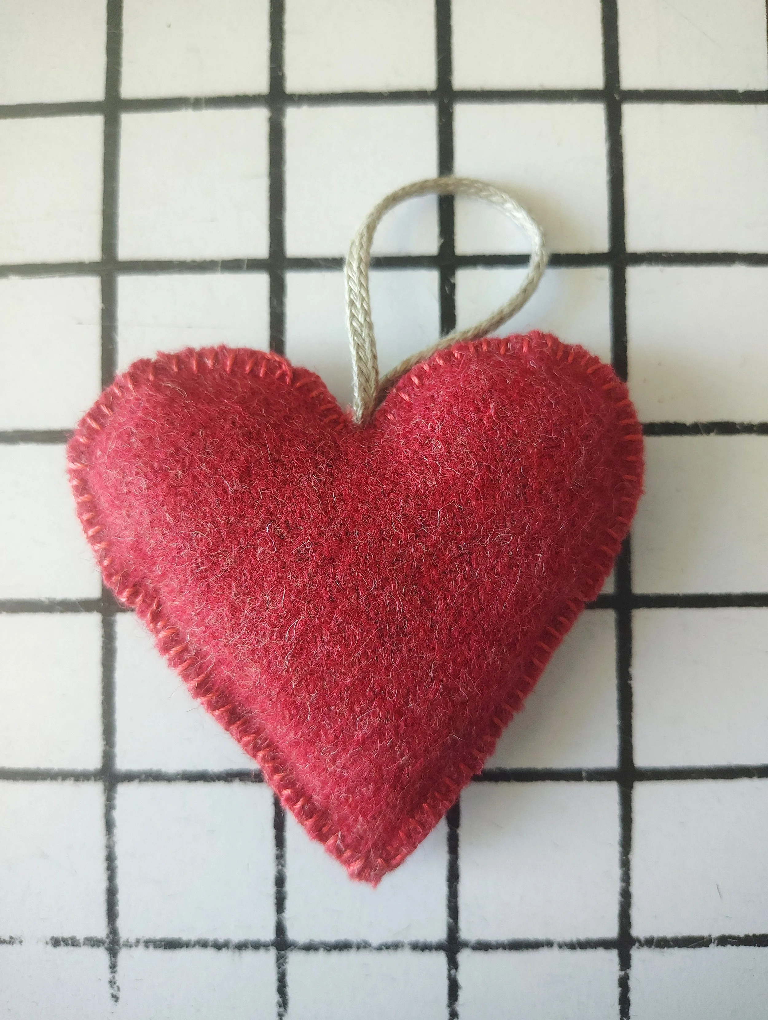 Heart Pincushion Buttonhole stitching no needles.jpg