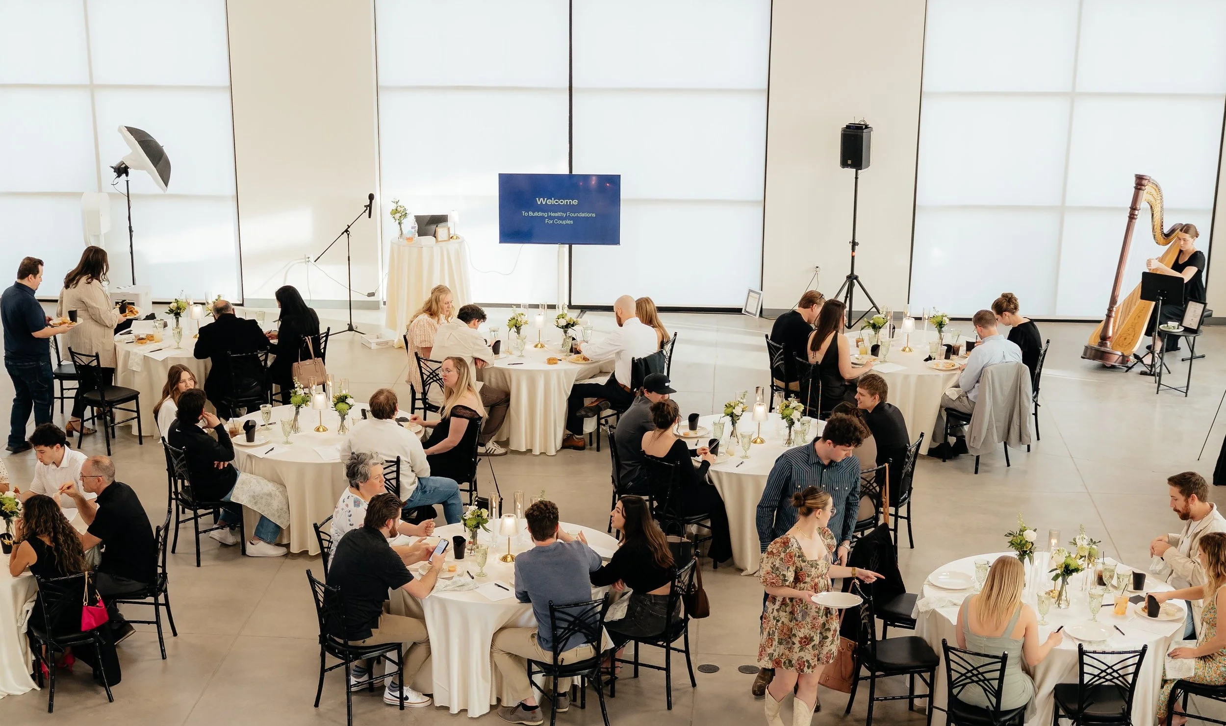 Corporate event guests in Enchanted Events Center, Herriman